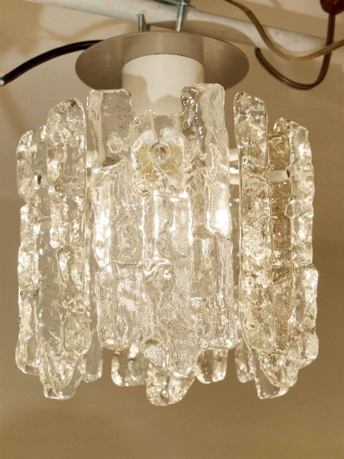 Kalmar Franken KG
Austria, 1960s

Fantastic petite ice glass flush mounted pendant with six pieces of glass.

Takes single medium base bulb, up to 100 watts. New wiring.

Due to structure of pendant drop height is not adjustable.
FLD Lighting