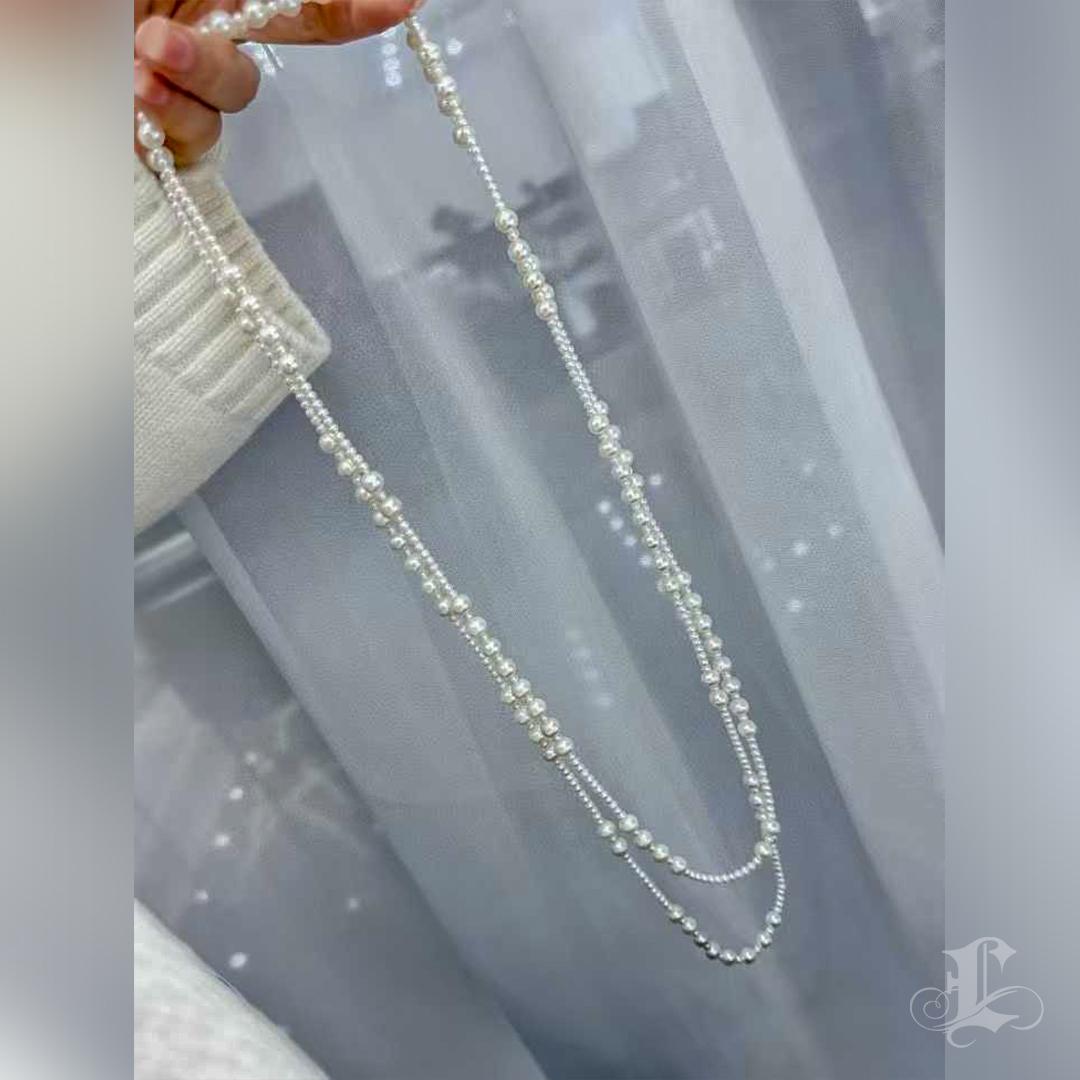 【Petite Signature】 Sautoir de perles d'eau douce Harmonie en cascade en vente 1