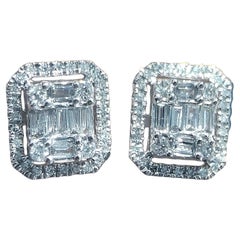 【Petite Signature】Pendientes de diamantes con halo de 0,36 ct en oro blanco de 18 quilates