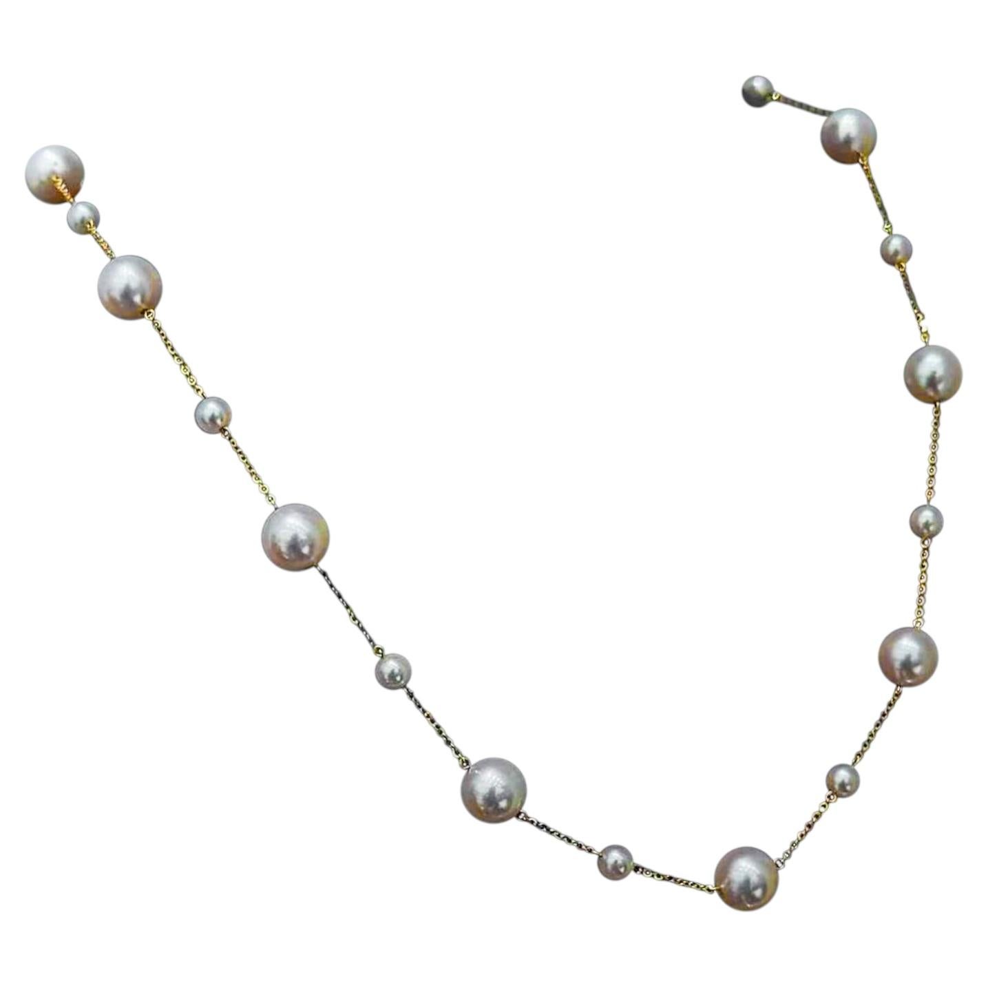 Collana a stazione di perle Akoya con oro 18K