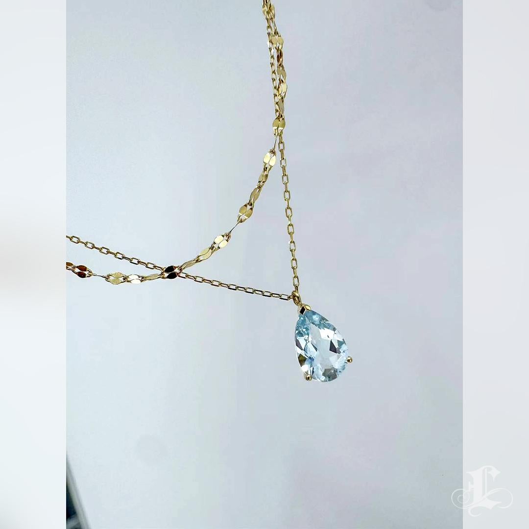 【Petite Signature】Collana con ciondolo a goccia di acquamarina in oro 18 carati con doppia catena in vendita 2