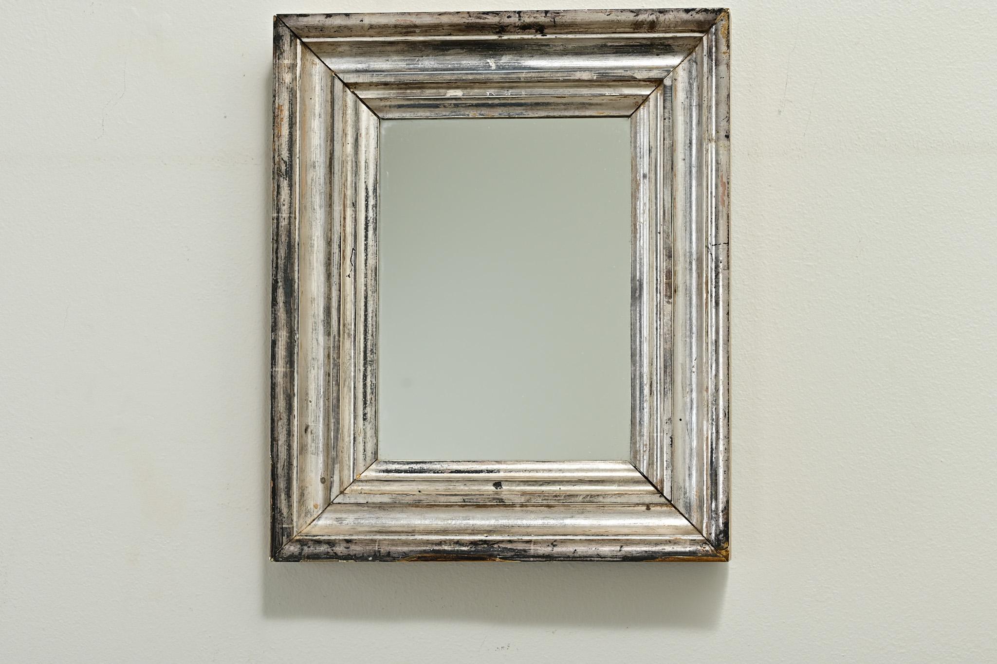 A darling little silver gilt mirror - made recently - using repurposed antique gilt framing. The antique silver gilt frame has been cut down and used to make a small frame which houses a pane of new mirrored glass. Currently, the mirror is oriented