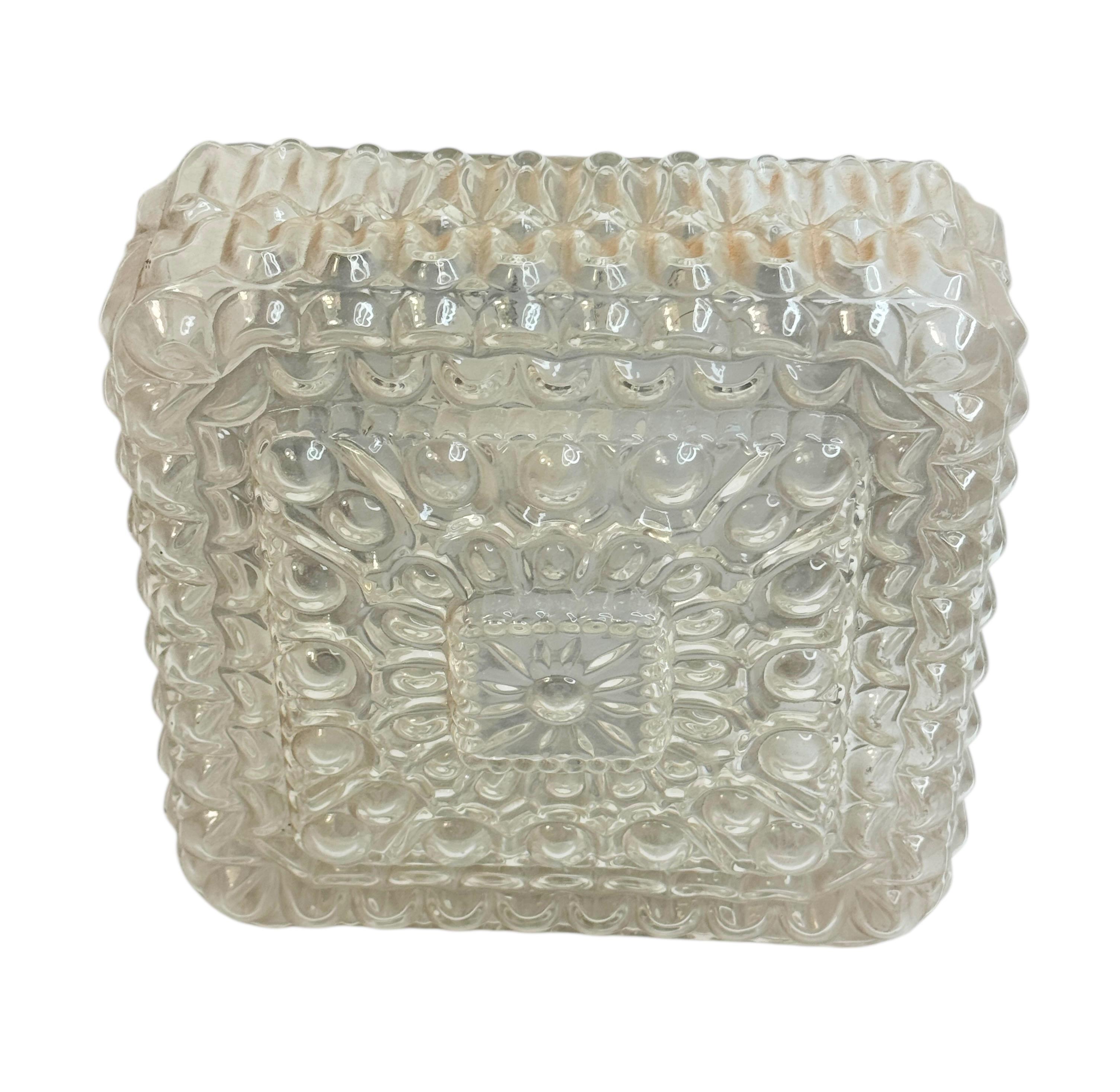 Petite bubble pattern flush mount. Made in Austria. Gorgeous textured glass flush mount with metal fixture. The Fixture requires one European E27 / 110 Volt Edison bulb, up to 60 watts. Found at an Estate Sale in Vienna, Austria. Nice addition to