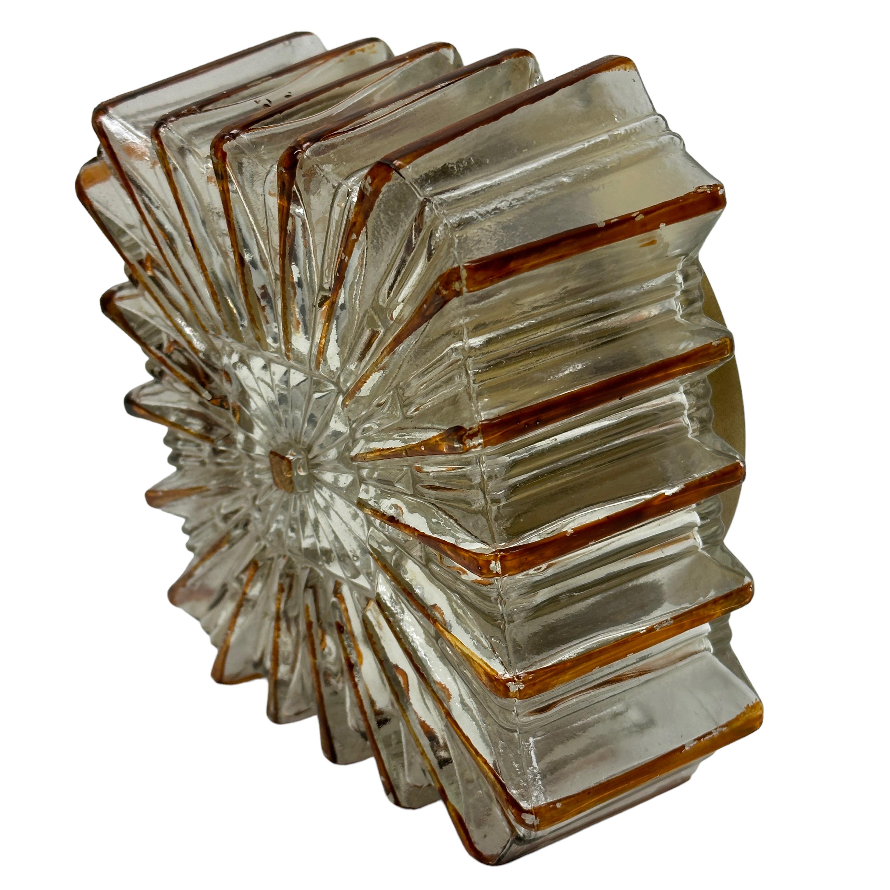 Petite starburst pattern flush mount. Made in Germany by Glashuette Limburg. Gorgeous textured glass flush mount with metal fixture. The Fixture requires one European E14 / 110 Volt Candelabra bulb, up to 60 watts. A nice addition to any room.