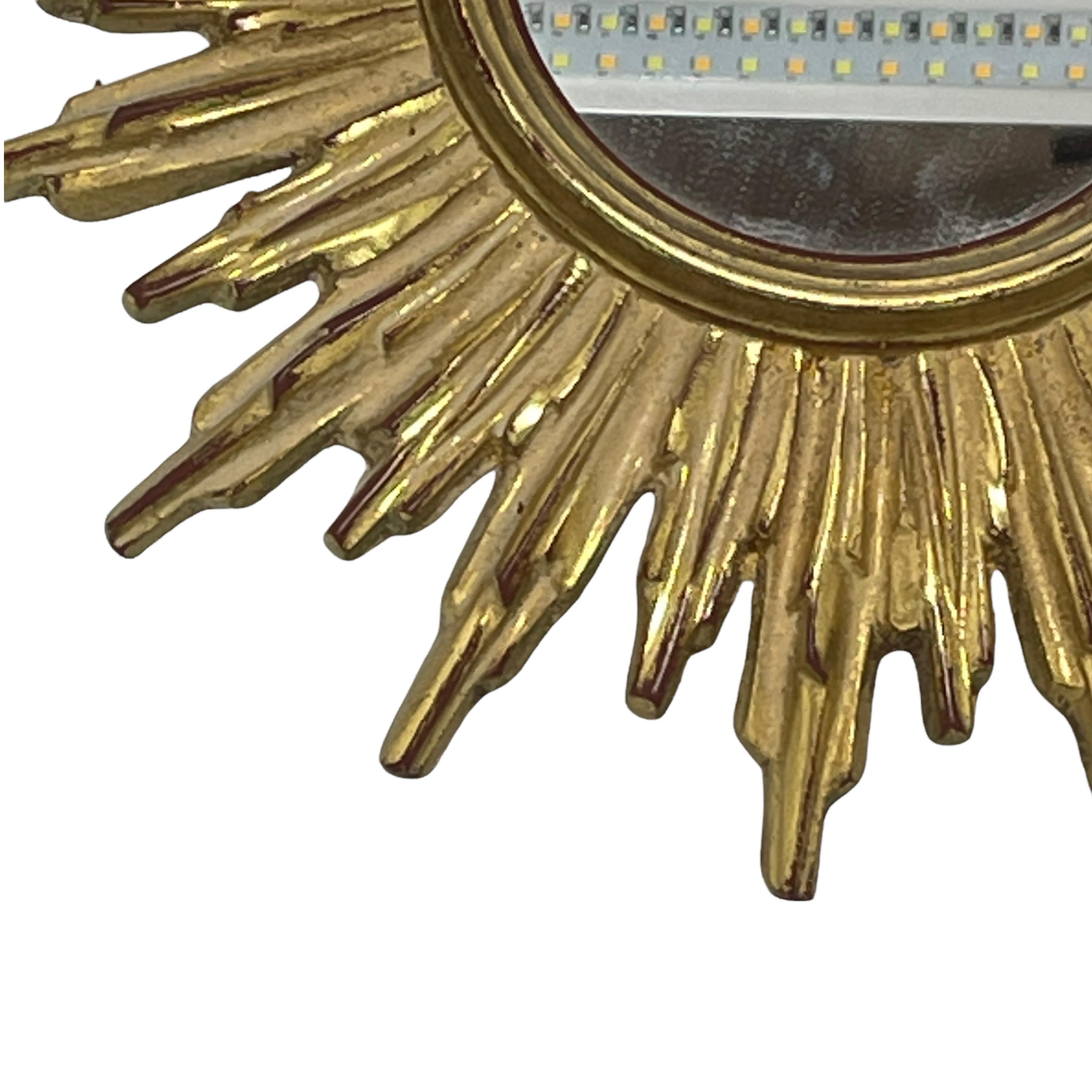 A gorgeous petite starburst mirror. Made of gilded Resin. No chips, no cracks, no repairs. It measures approximate: 10