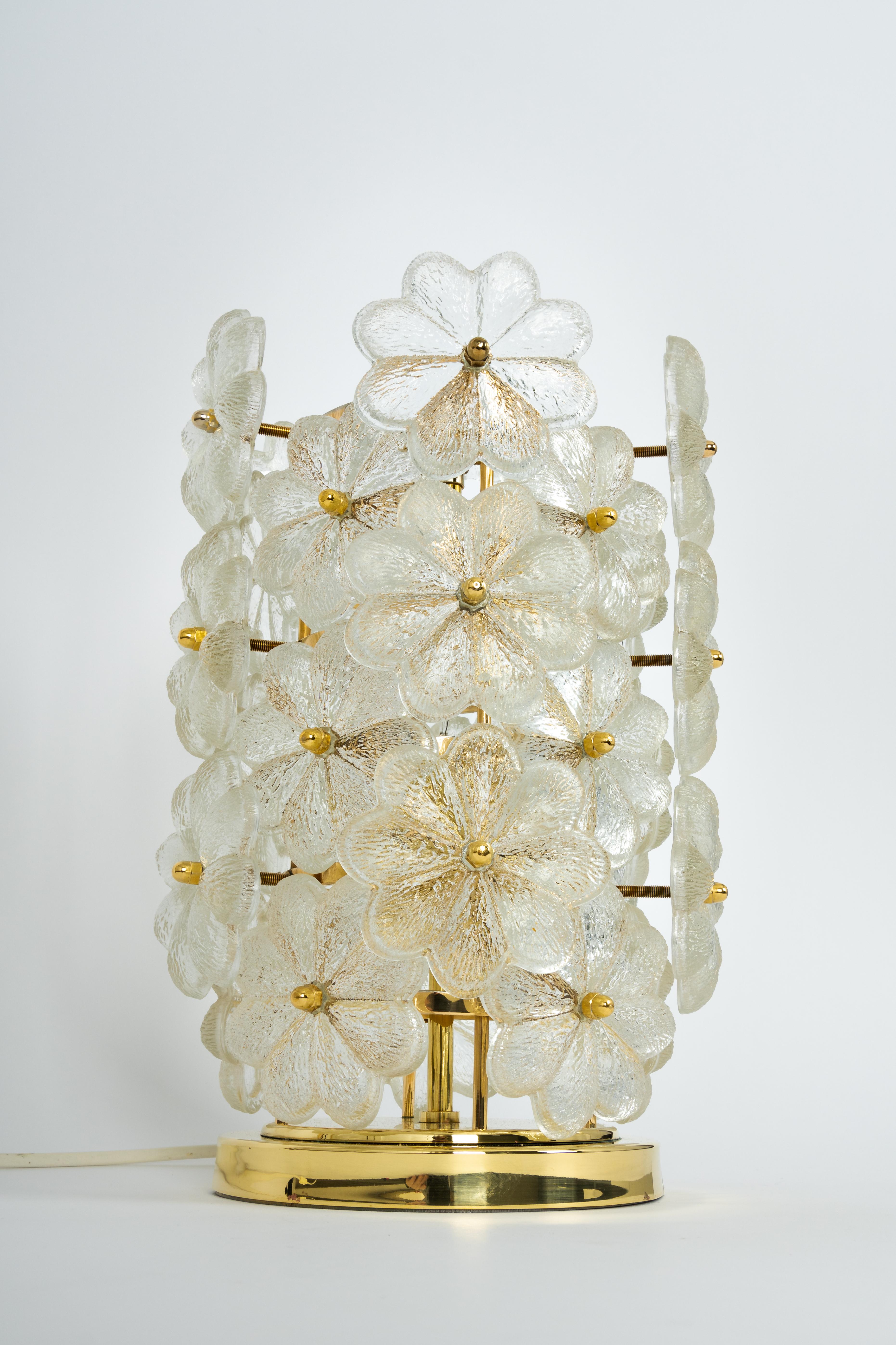 Petite stunning Murano glass flower table light. The light is composed of many glass flowers over a polished brass base, made by Ernst Palme in Germany, 1970s.

It needs 1 x E27 standard bulb.
Light bulbs are not included. It is possible to
