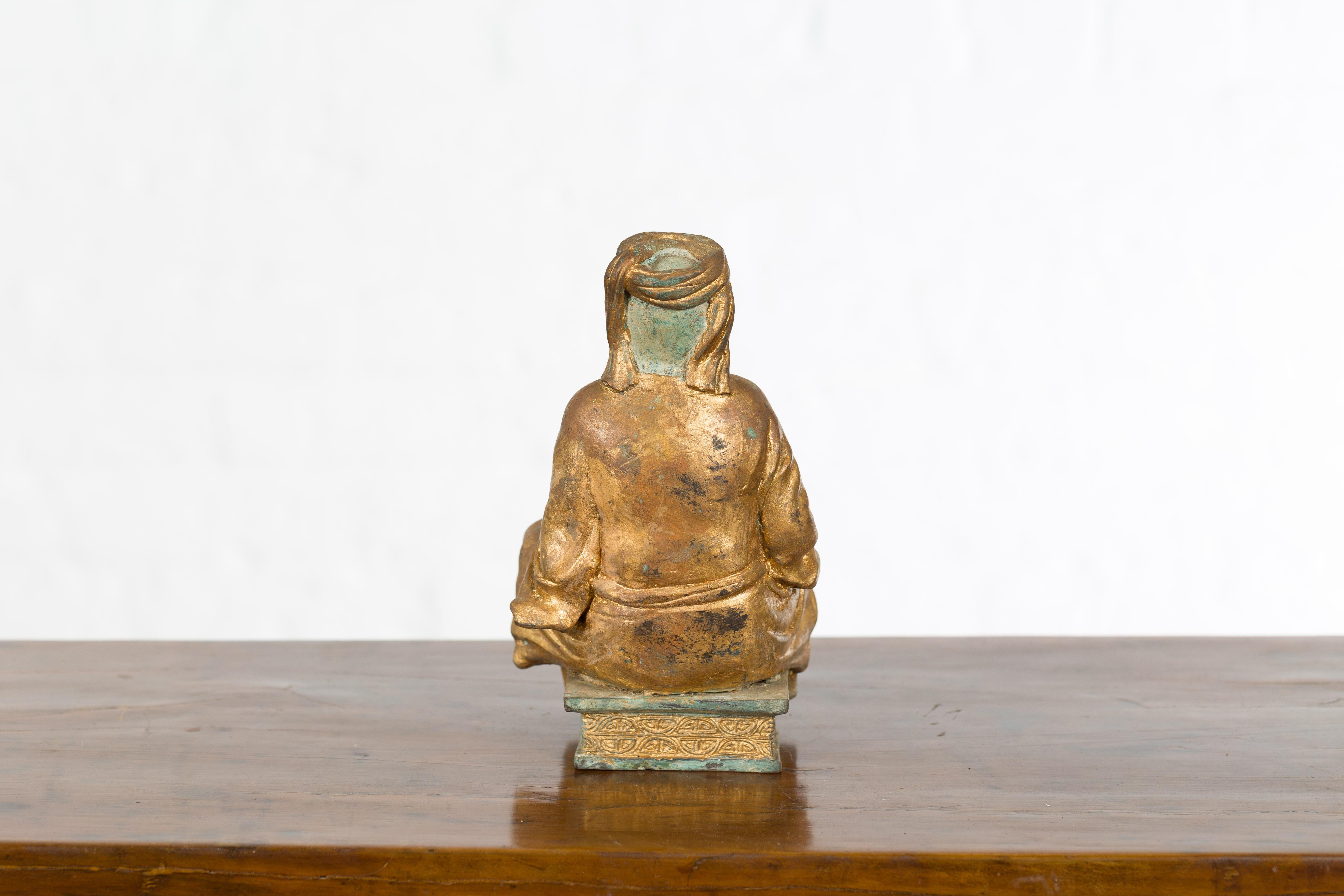 Petite Thai Verde and Gilded Statuette of a Seated Monk Holding a Conch Shell 3