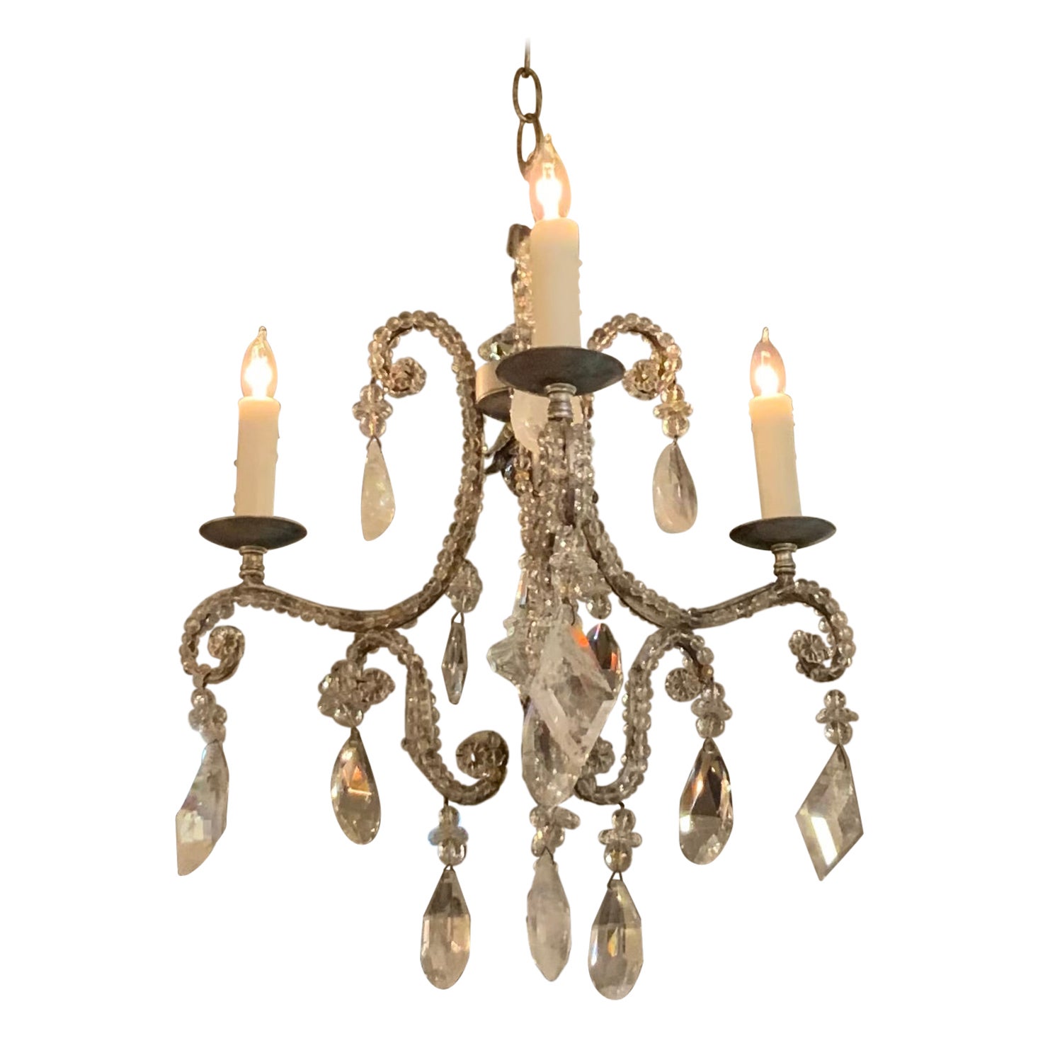 Petite three light rock crystal and clear crystal chandelier with silver hue bas For Sale