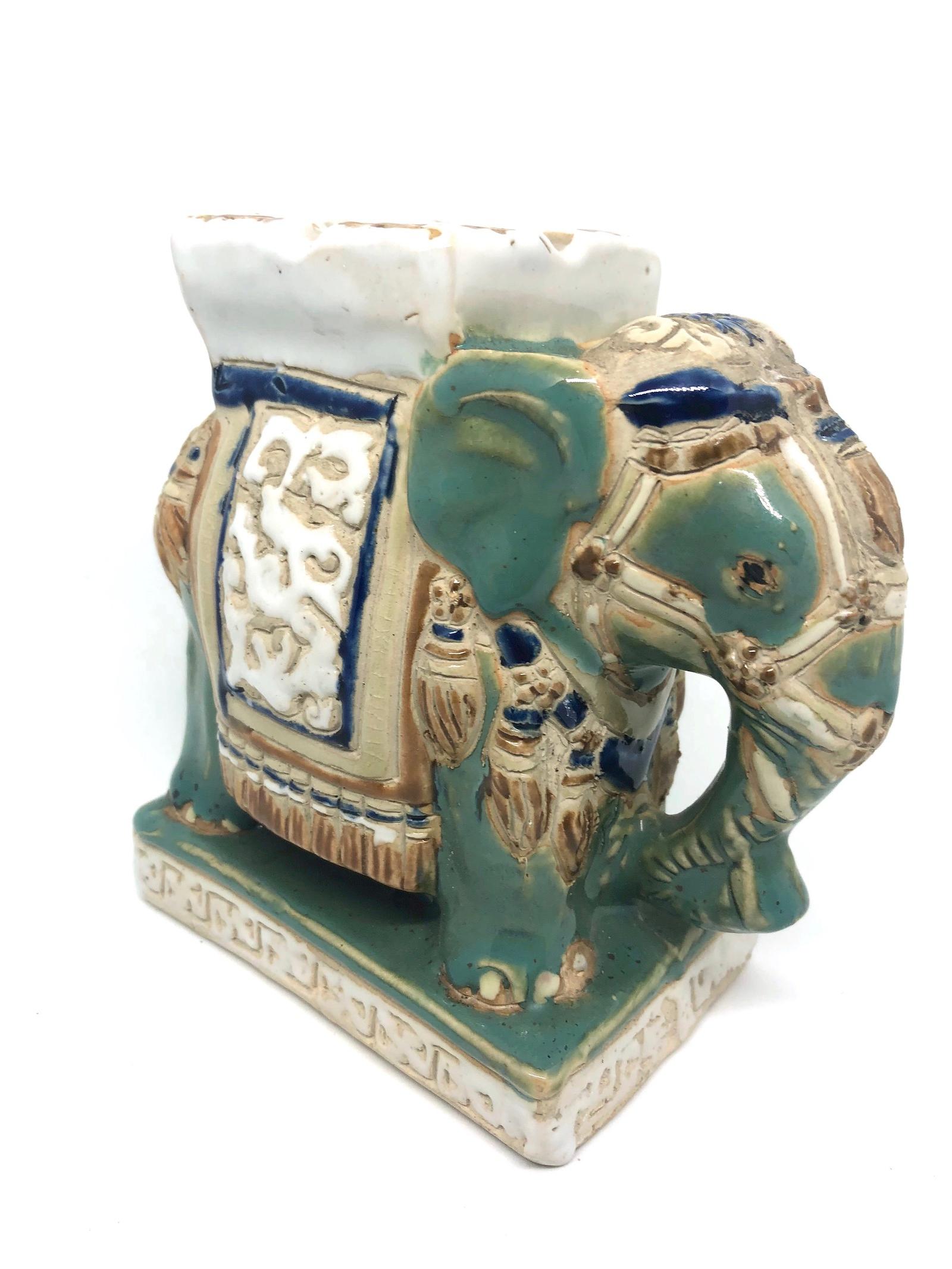 Petite mid-20th century glazed ceramic elephant Ashtray. Handmade of ceramic. Nice addition to your home, patio or garden.
  
