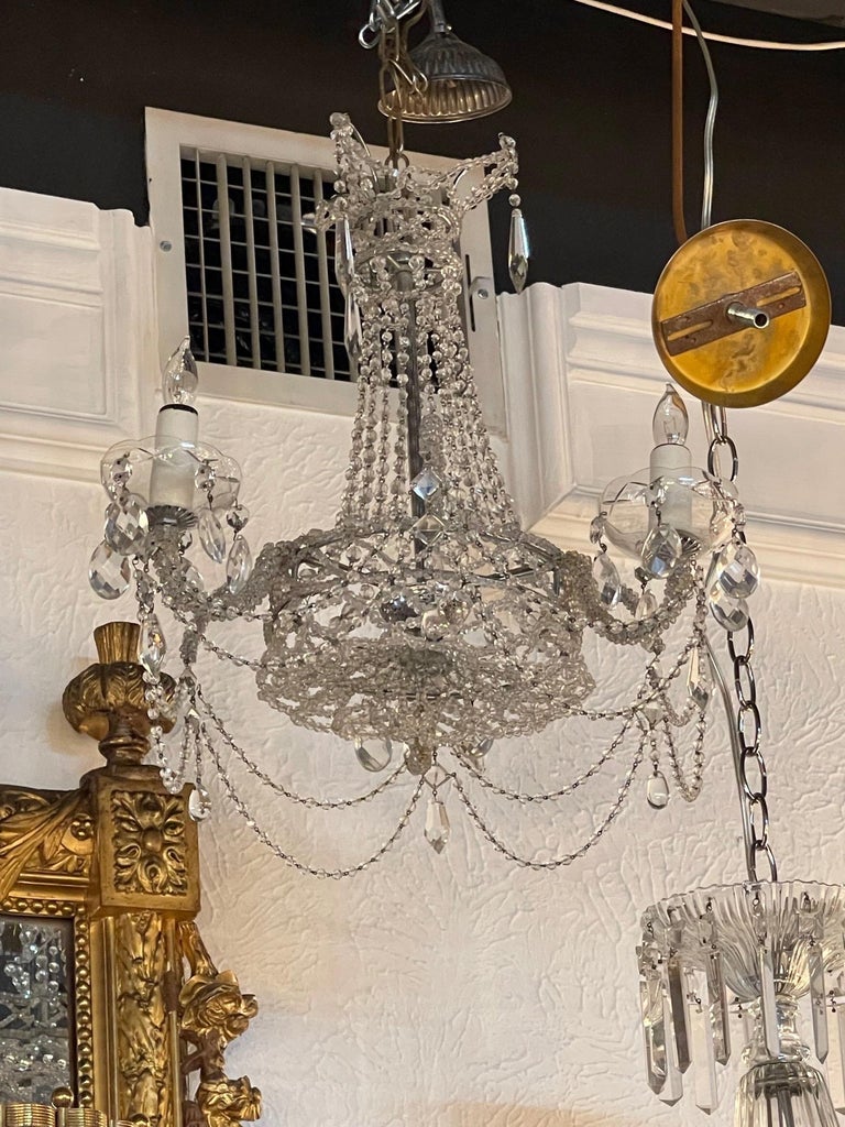 Very pretty petite vintage Italian 3 light beaded crystal chandelier. Has a lot of sparkle and great for a small space. Lovely!!