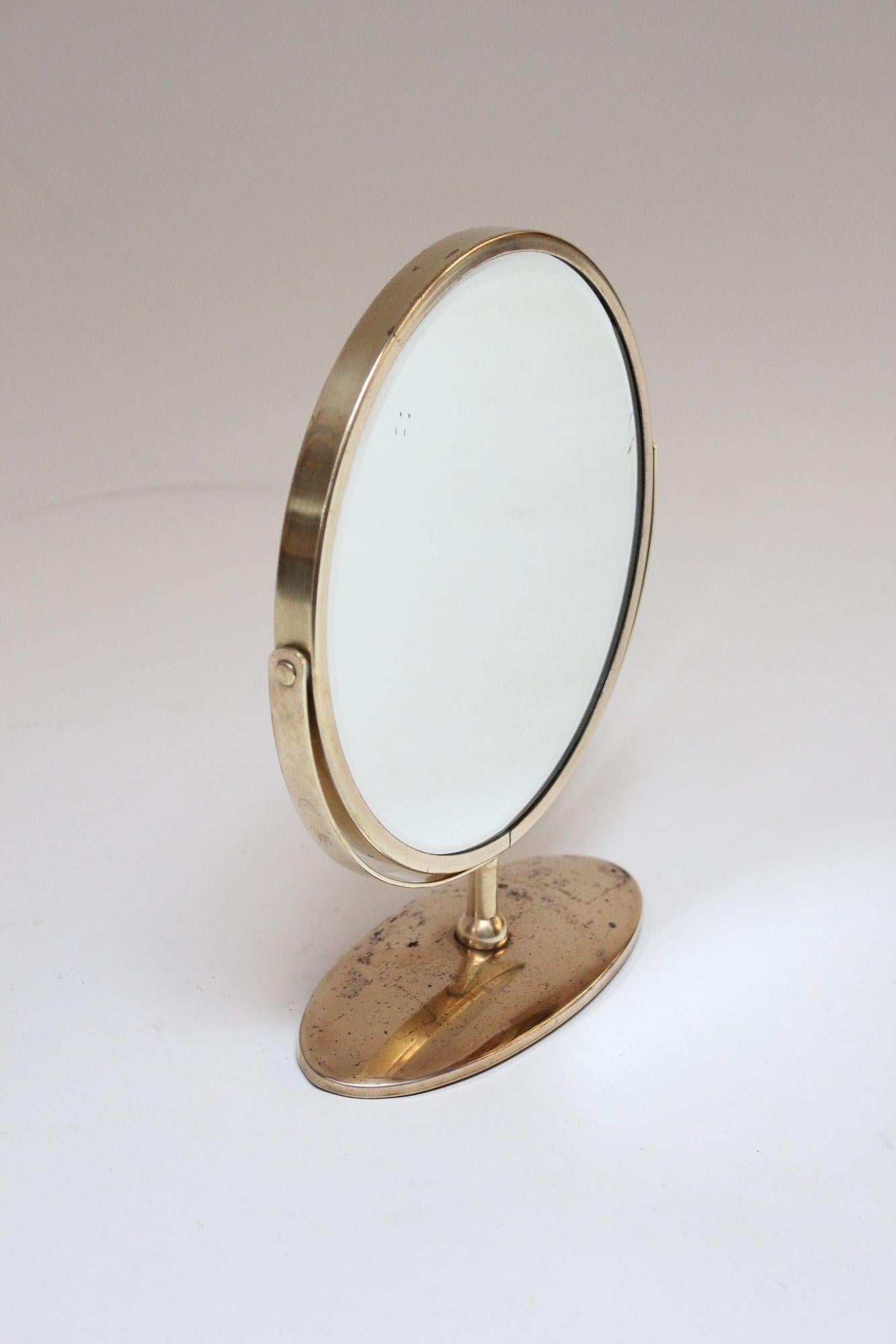 Mid-Century Modern Petite Vintage Polished Brass Swiveling Double Sided Glass Vanity Table Mirror For Sale