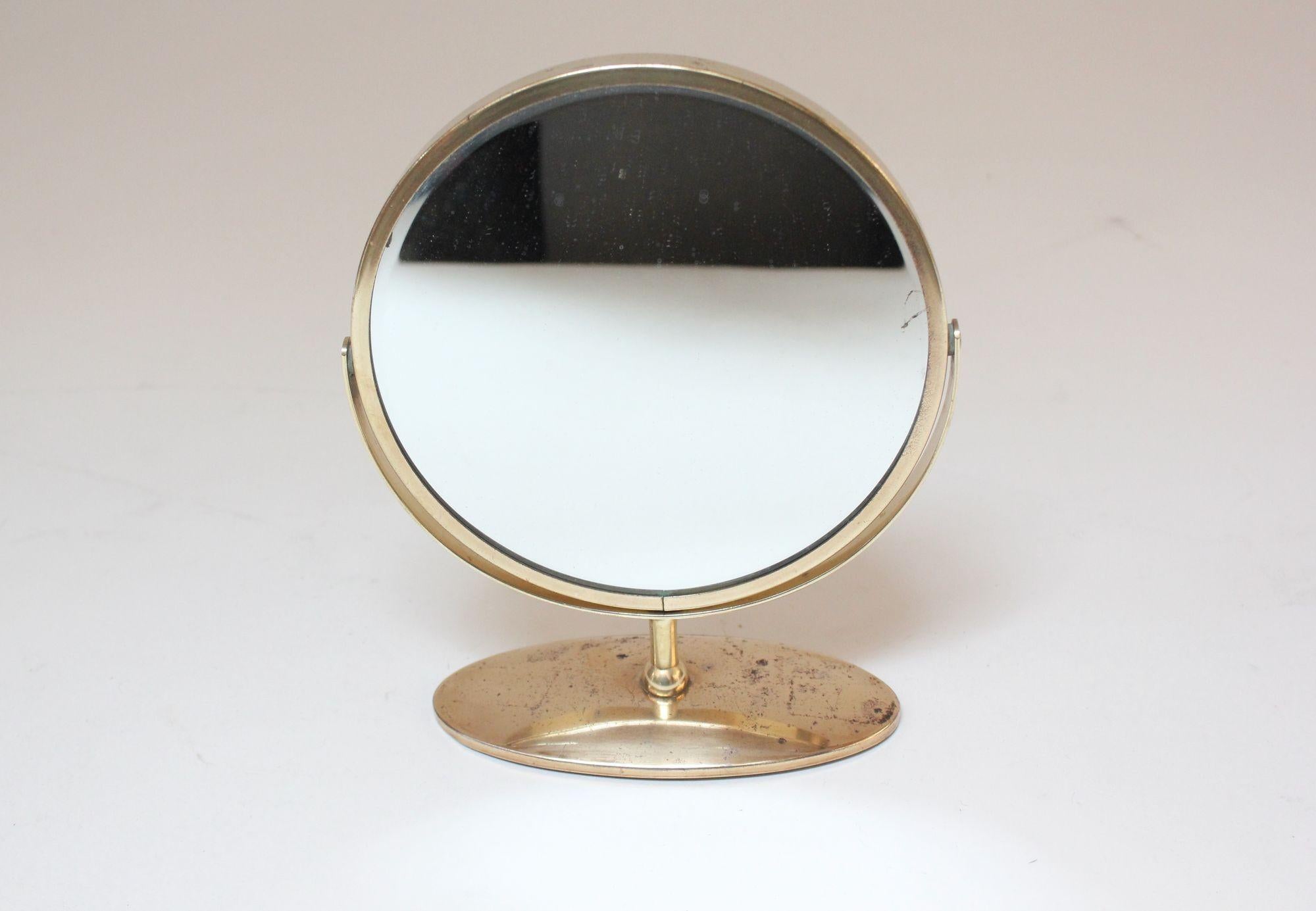 Mid-20th Century Petite Vintage Polished Brass Swiveling Double Sided Glass Vanity Table Mirror For Sale