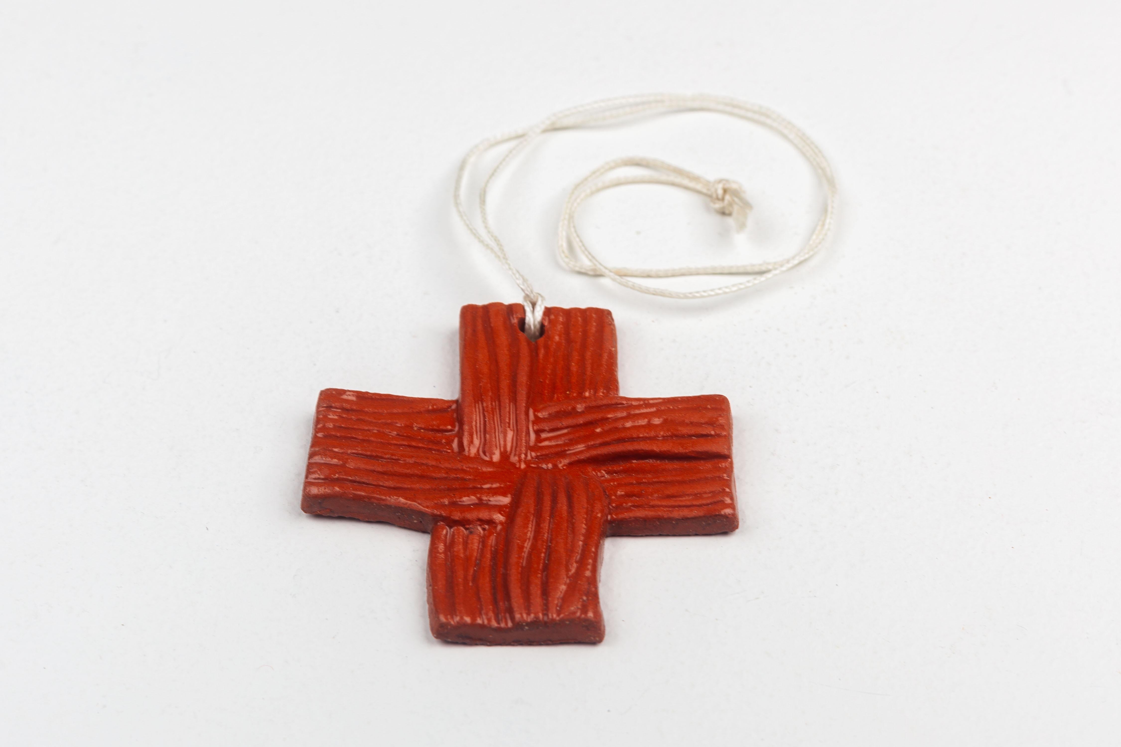Ceramic Petite Wall Cross, handmade ceramic, woven relief in glossy terracotta, Europe For Sale