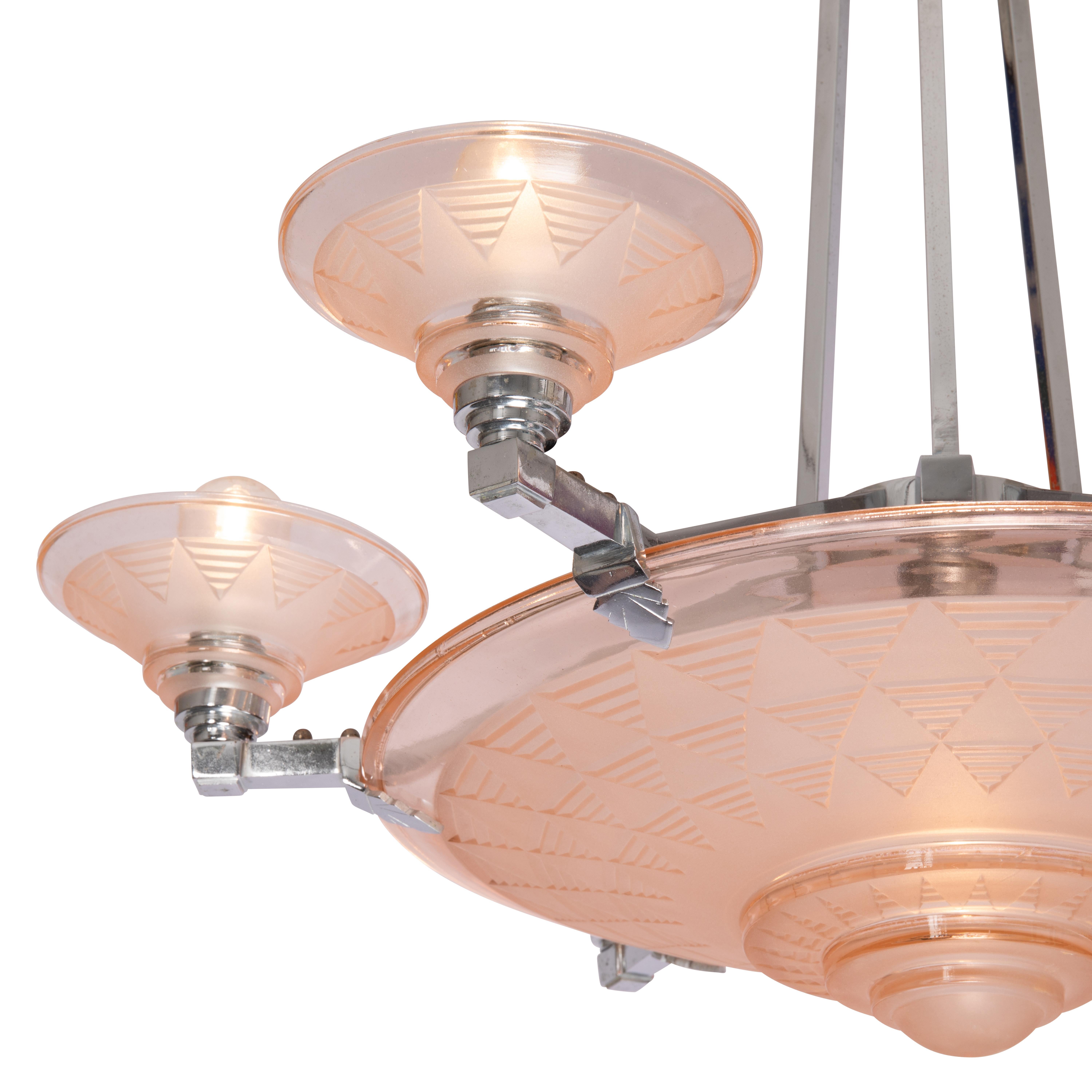 Circular Art Deco nickelled bronze and salmon pink frosted glass chandelier dating from the 1920’s or 1930’s by Henri Petitot.

A decorative, flush mount, conical canopy (ceiling mount at the top that serves to cover the electrical box in the