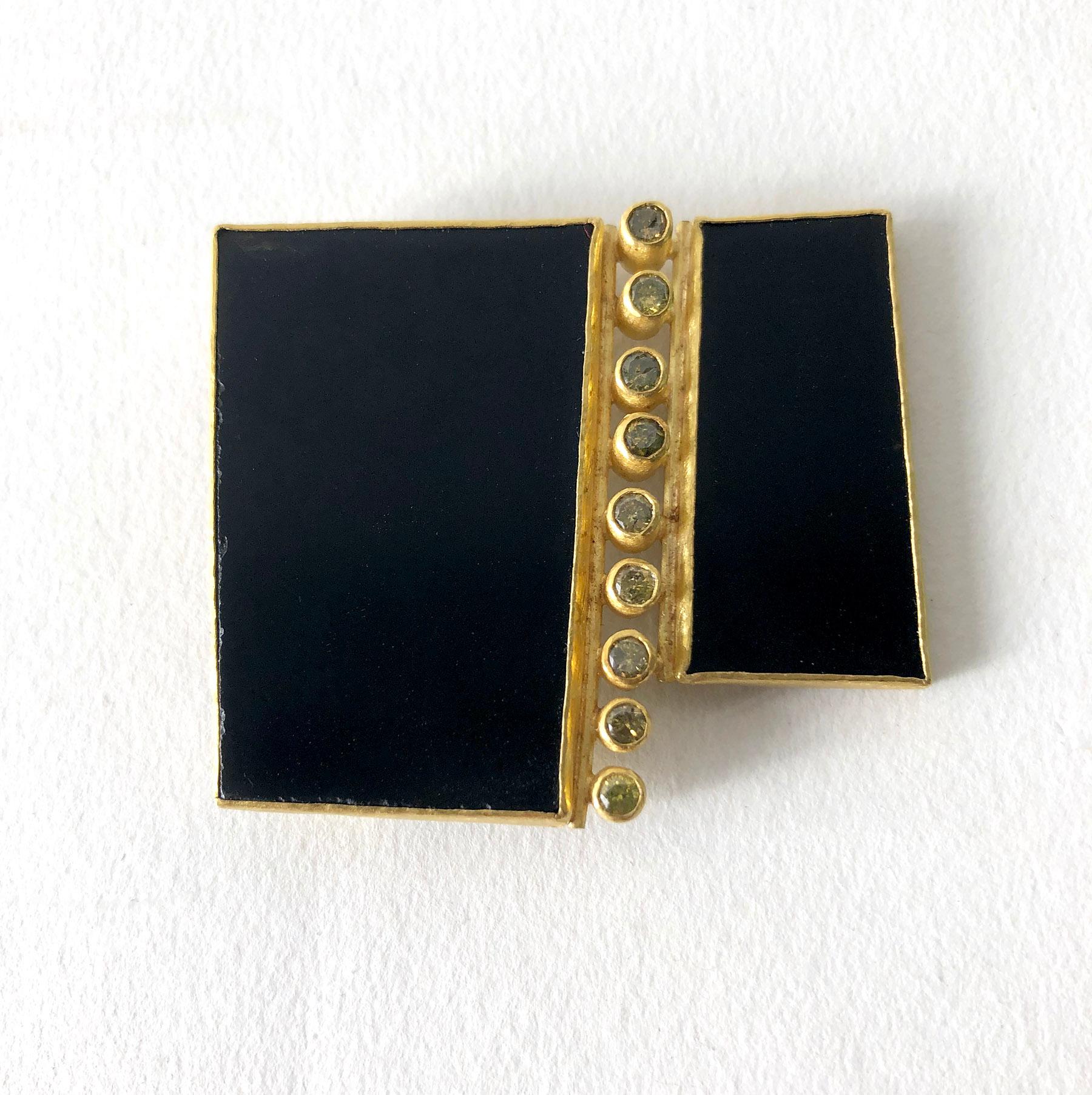Contemporary 18k gold, onyx and semi precious gemstones pendant/brooch, by German born Petra Class. Class is a classically trained goldsmith who founded a small jewelry design studio in San Francisco in 1991.  Pendant brooch measures 1.75