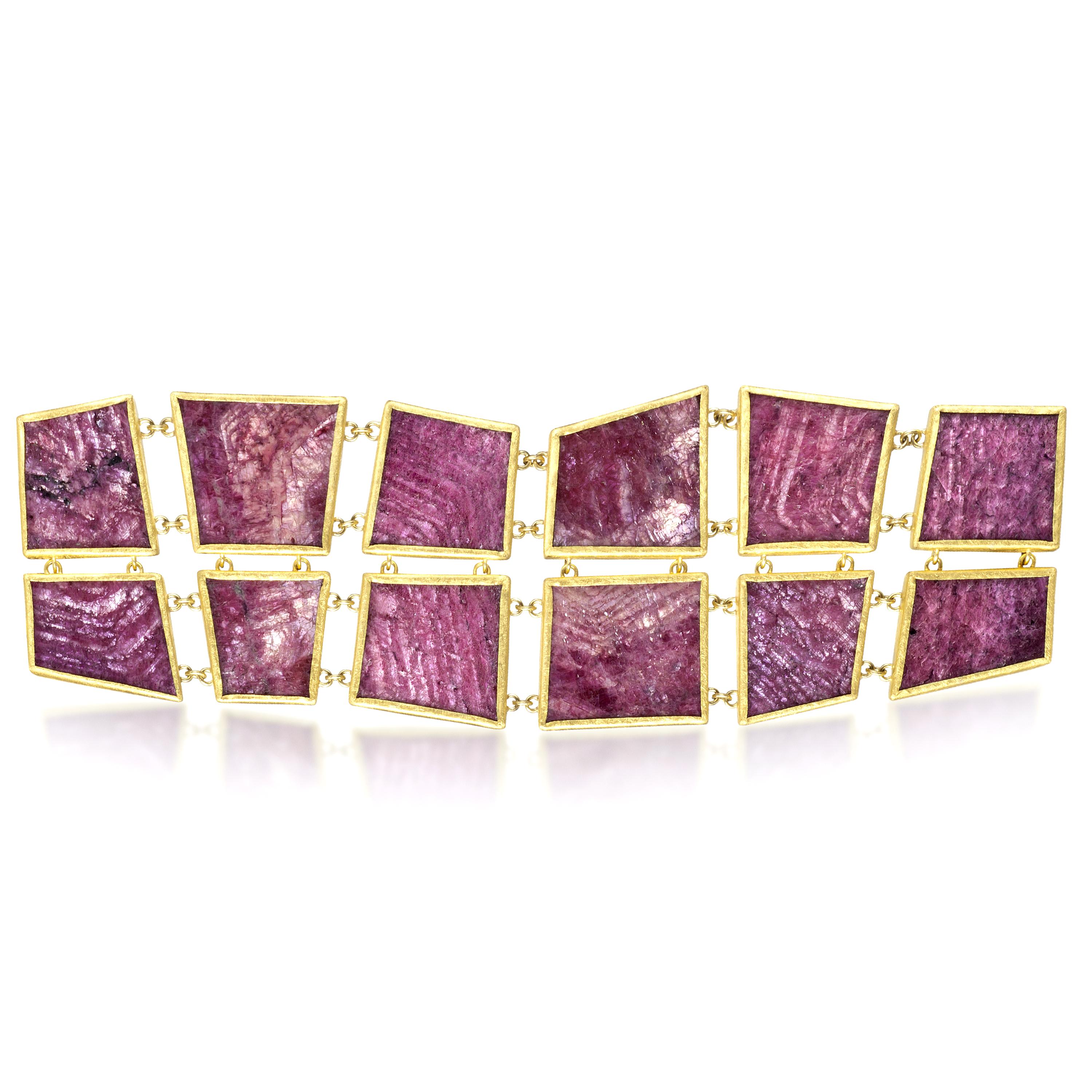 One of a Kind Ruby Slice Bracelet handcrafted by renowned jewelry artist Petra Class featuring two rows of ruby slices totaling 340 carats set in 22k yellow gold with an 18k gold clasp. Stamped and hallmarked. 