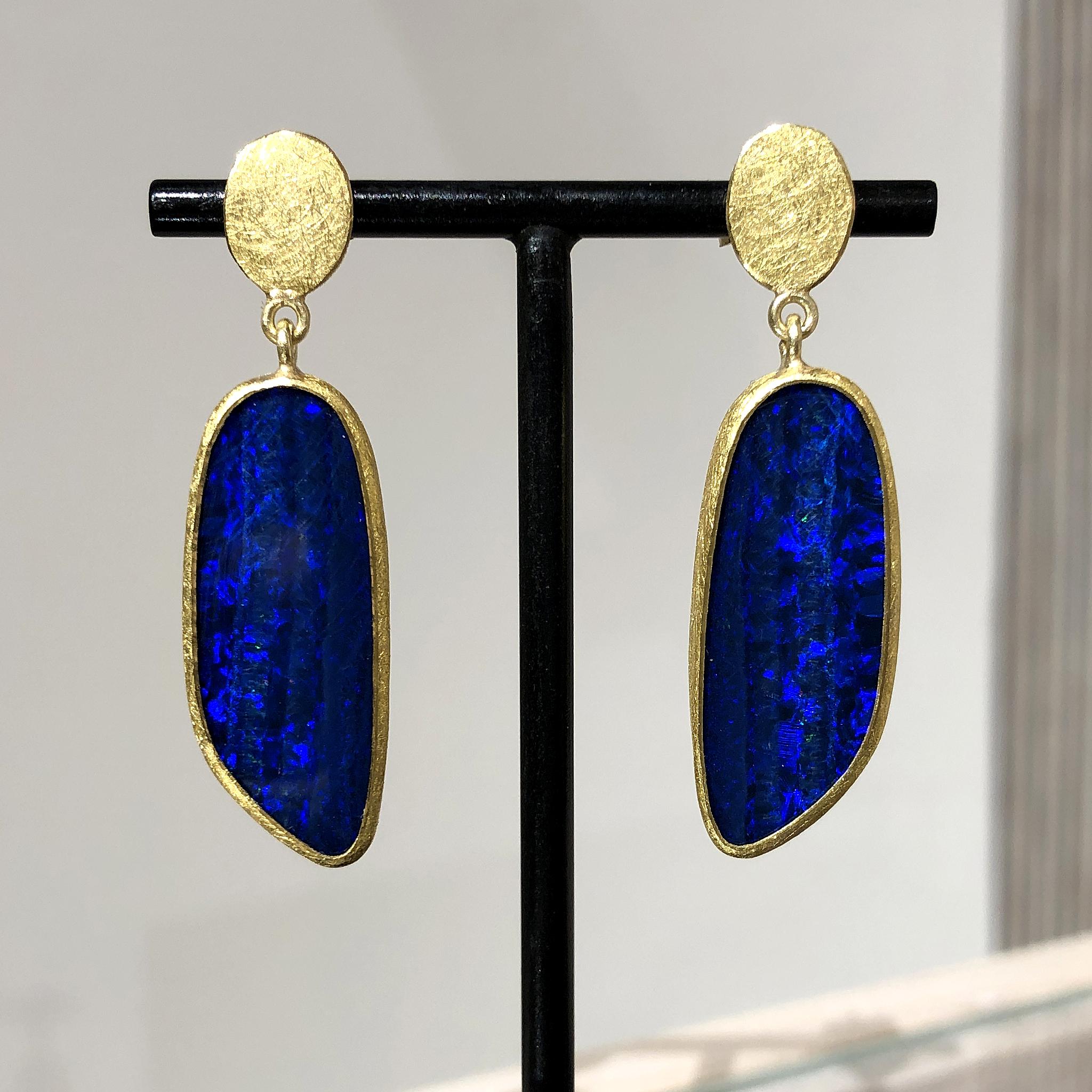 Drop Earrings handmade by acclaimed jewelry artist Petra Class in signature finely-textured 22k yellow gold featuring a beautifully matched pair of deep violet blue Australian opal doublets with primary violet, blue, and green flash and flickers of