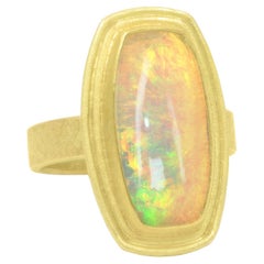 Petra Class Electrifying Ethiopian Opal Framed 22k Gold One of a Kind Ring