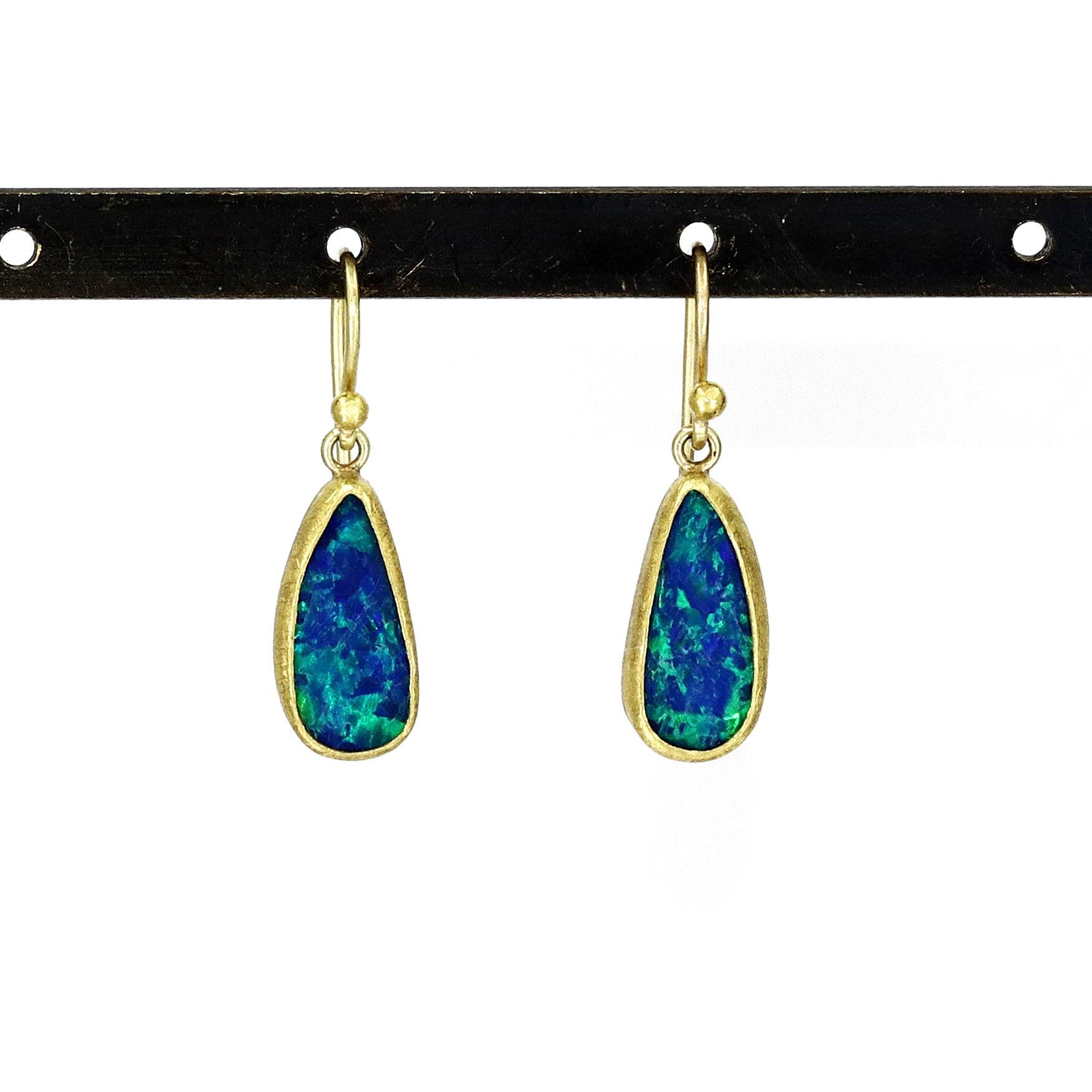 Fire Earrings handcrafted by acclaimed jewelry maker Petra Class featuring two spectacular matched Australian blue opal doublets with electric neon green and blue flash, bezel-set in the artist's signature-finished 22k yellow gold on 18k yellow gold