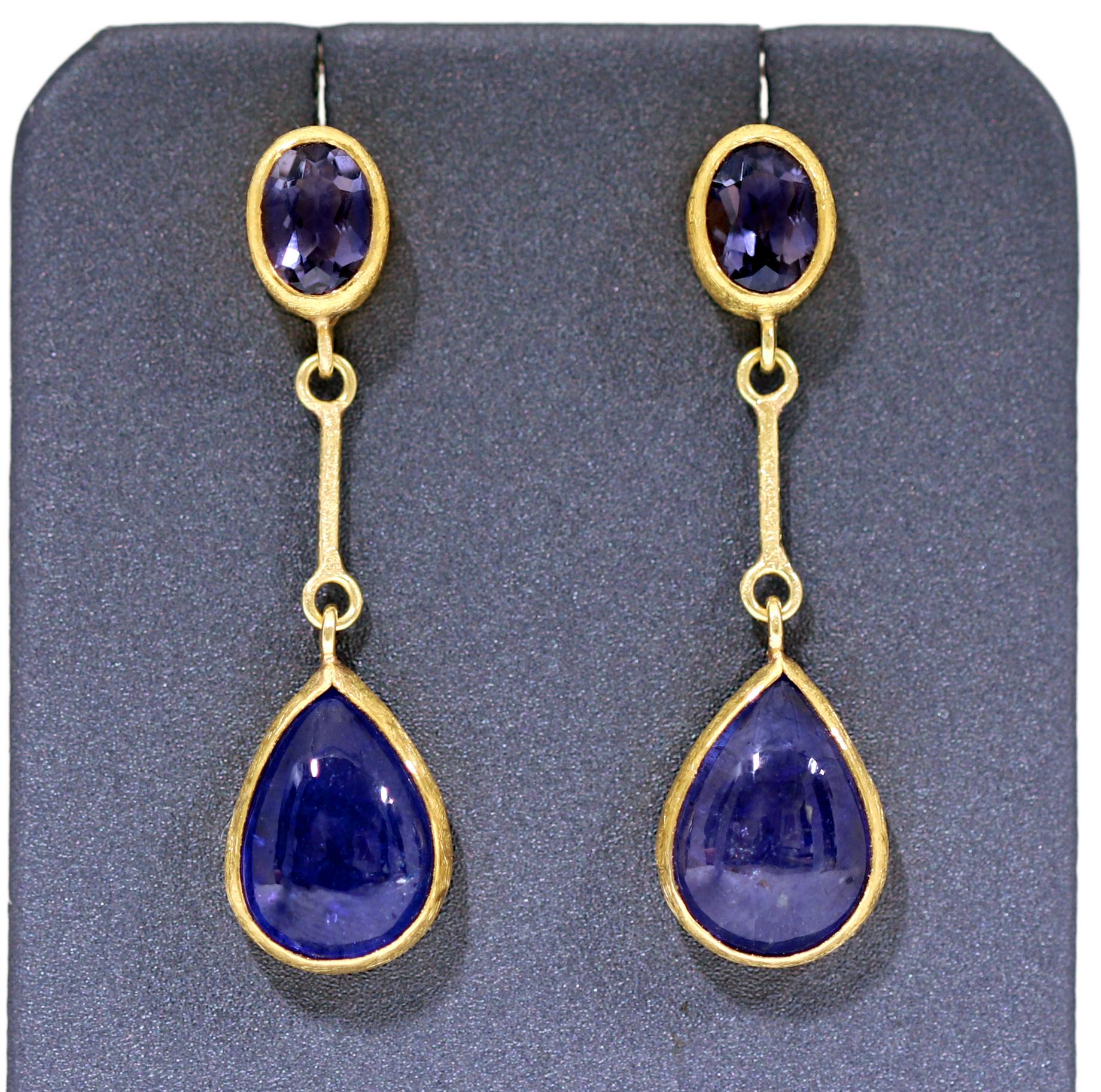 One of a Kind Segment Drop Earrings hand-fabricated by jewelry maker Petra Class featuring both a matched pair of shimmering faceted tanzanite ovals and a matched pair of gorgeous cabochon cut tanzanite drops, all bezel-set in signature-finished 22k