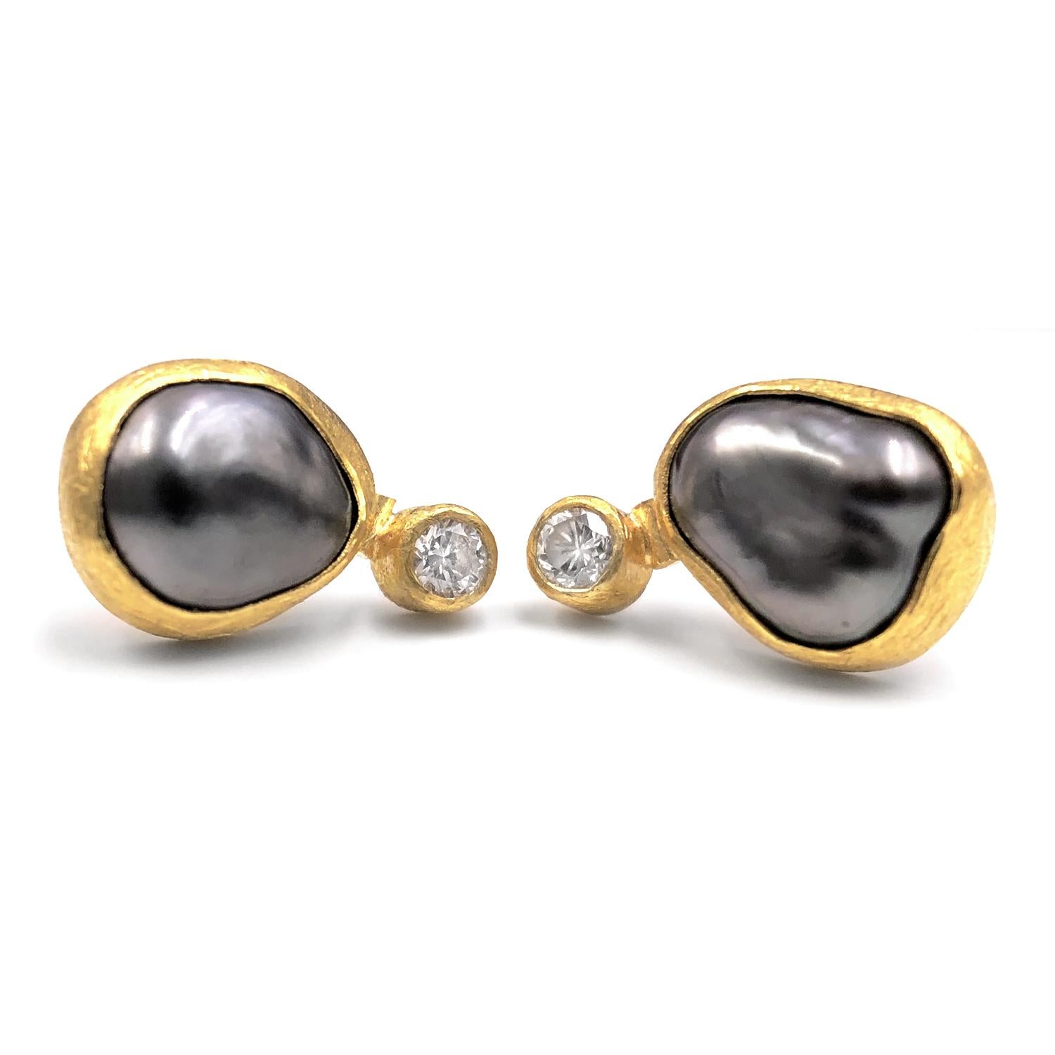 One of a Kind Double Stud Earrings handcrafted by jewelry artist Petra Class in signature-finished 22k yellow gold featuring a gorgeous pair of lustrous Tahitian keshi pearls accented with two 0.10 carat round brilliant-cut white diamonds (0.20tcw).