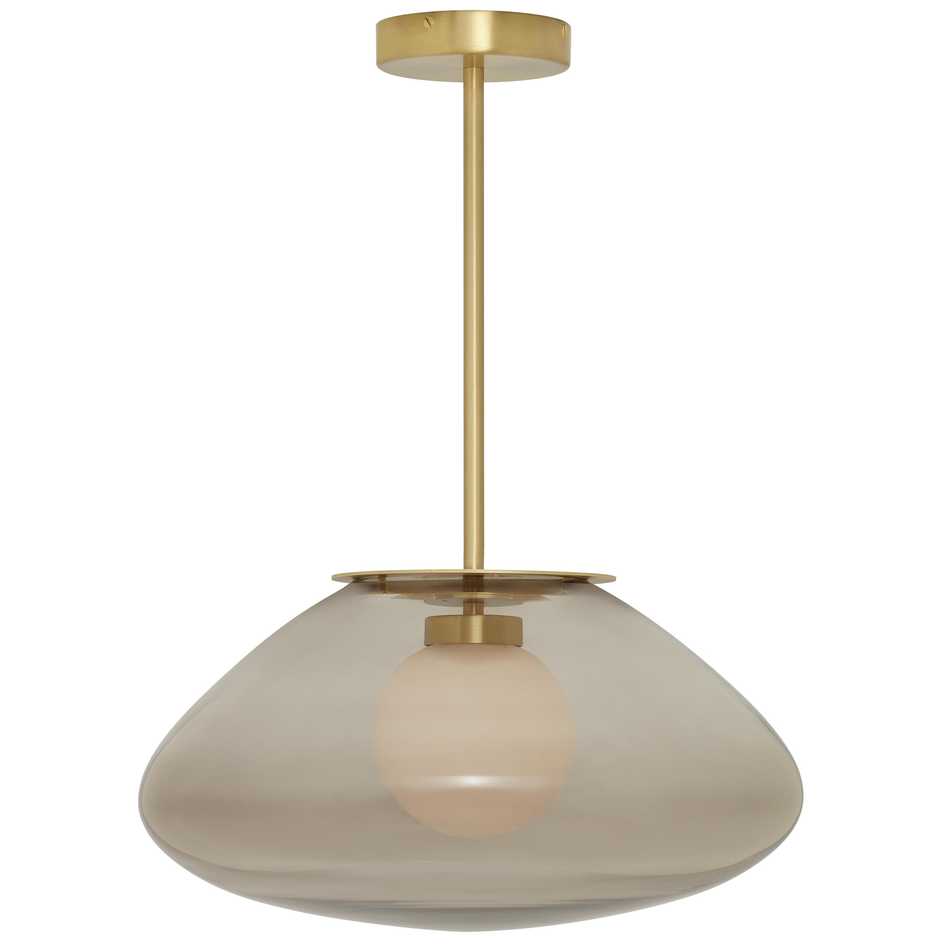 Petra small pendant by CTO Lighting
Materials: satin brass with smoked glass shade and hand shaped smoked glass inner shade
Also available in dark bronze with smoked glass shade and hand shaped smoked glass inner shade,
satin brass with smoked