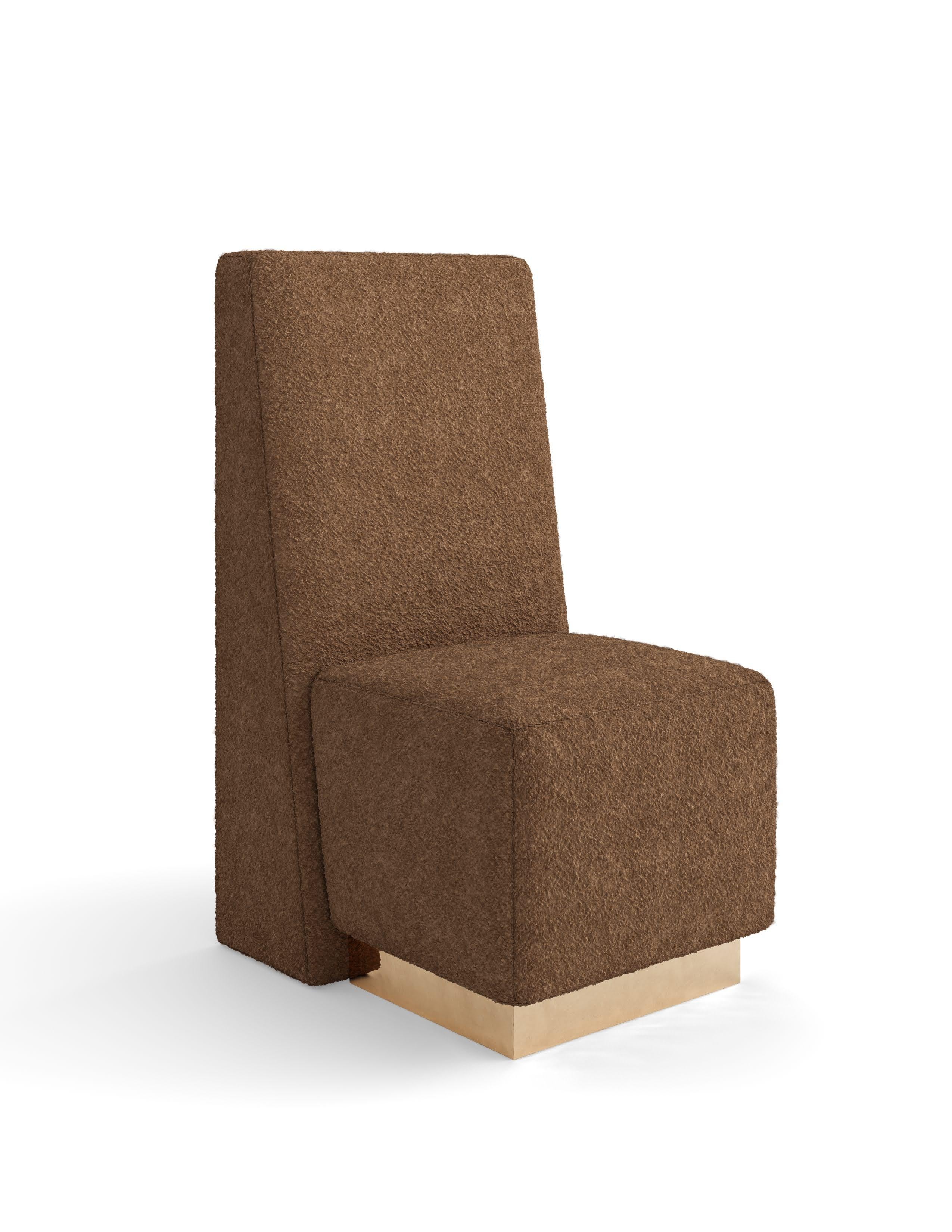 Experimenta la unión perfecta de elegancia contemporánea y comodidad excepcional con la distinguida Silla de Comedor Petras, donde la sofisticación arquitectónica se une al lujoso diseño de los asientos. Nuestra Silla de Comedor Petras ejemplifica