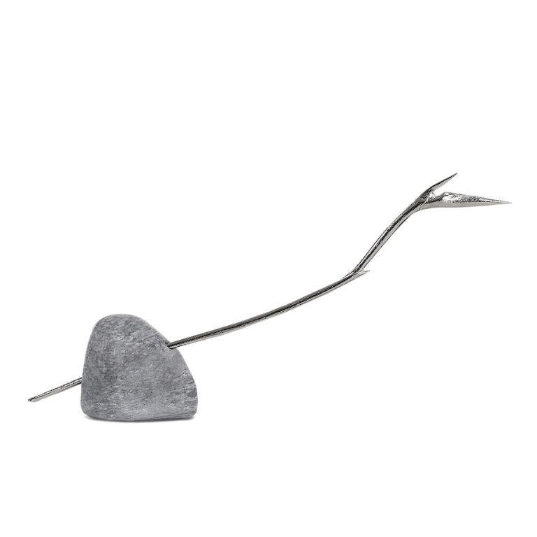 Introducing Pétrea, a breathtaking large-scale sculpture that epitomizes the harmonious blend of nature's elegance and masterful artistry. Crafted from exquisite Botticino marble and polished brass, this extraordinary piece draws inspiration from