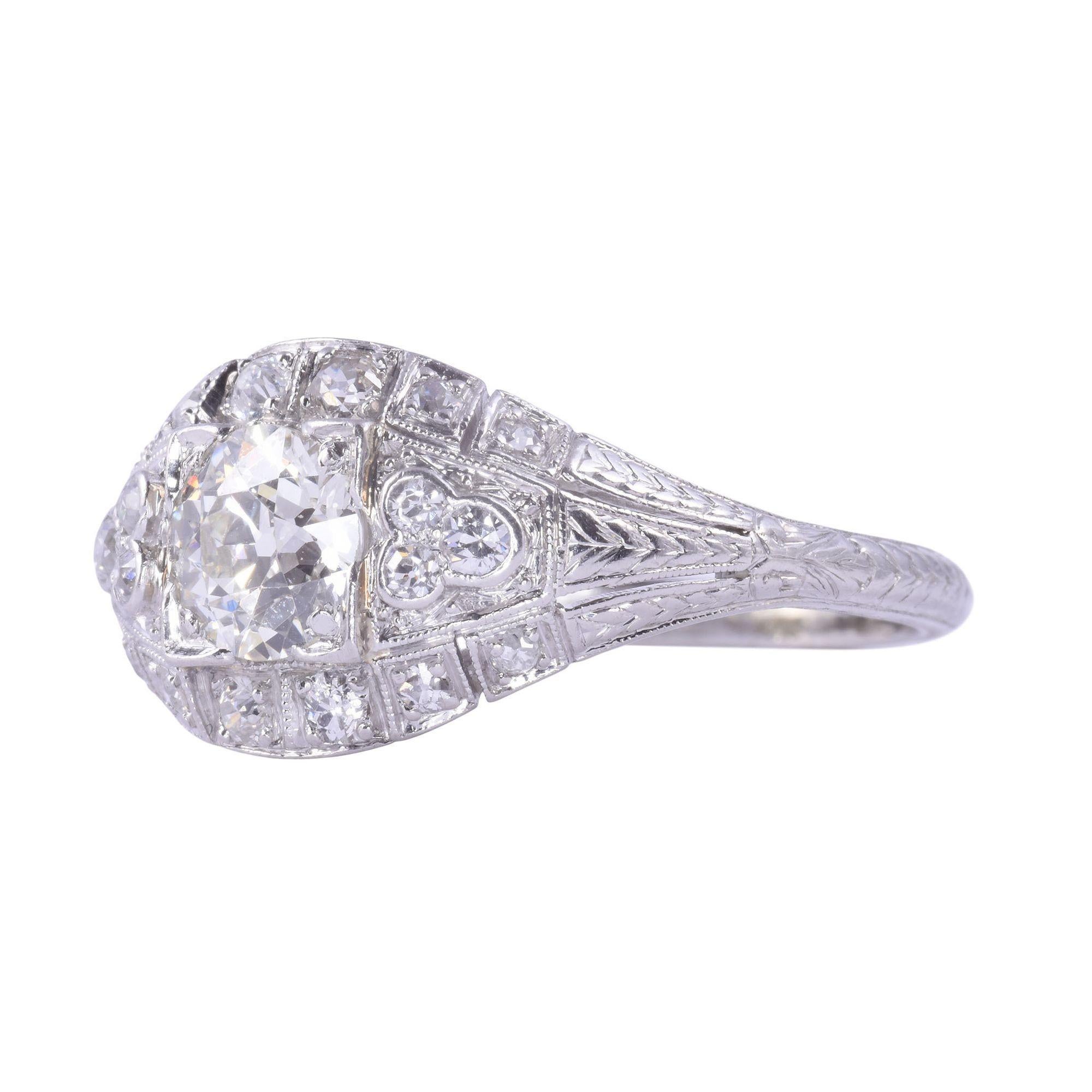 Antique Petri Art Deco platinum diamond engagement ring, circa 1920. This Art Deco engagement ring marked Petri is crafted in platinum. The platinum ring features an illusion set .80 carat old European cut diamond center with VS1 clarity and J