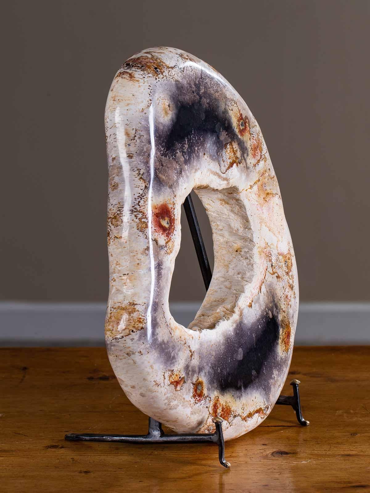 Contemporary Petrified Wood Ring Sculpture on Iron Stand