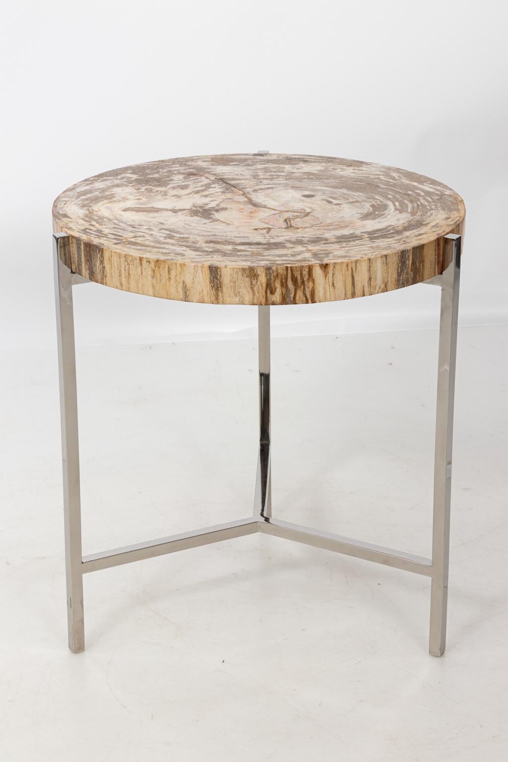 Contemporary petrified wood side table by Palececk Maxwell with metal base. Please note of wear consistent with age.