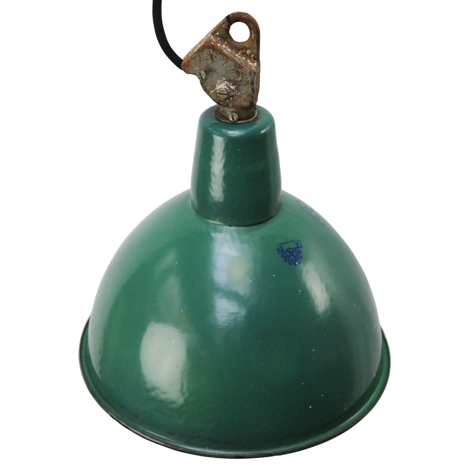 Industrial hanging light. Petrol green enamel white interior.

Weight: 2.0 kg / 4.4 lb

Priced per individual item. All lamps have been made suitable by international standards for incandescent light bulbs, energy-efficient and LED bulbs.