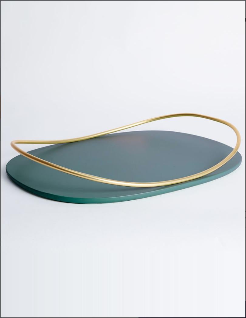 Petrol green Touché C tray by Mason Editions
Dimensions: 36 × 48 × 6.4 cm
Materials: Iron and MDF
Colours: taupe, cotto, burgundy, sage green, petrol green

A light metal rod that rests on the surface and then lifts up, almost touching the