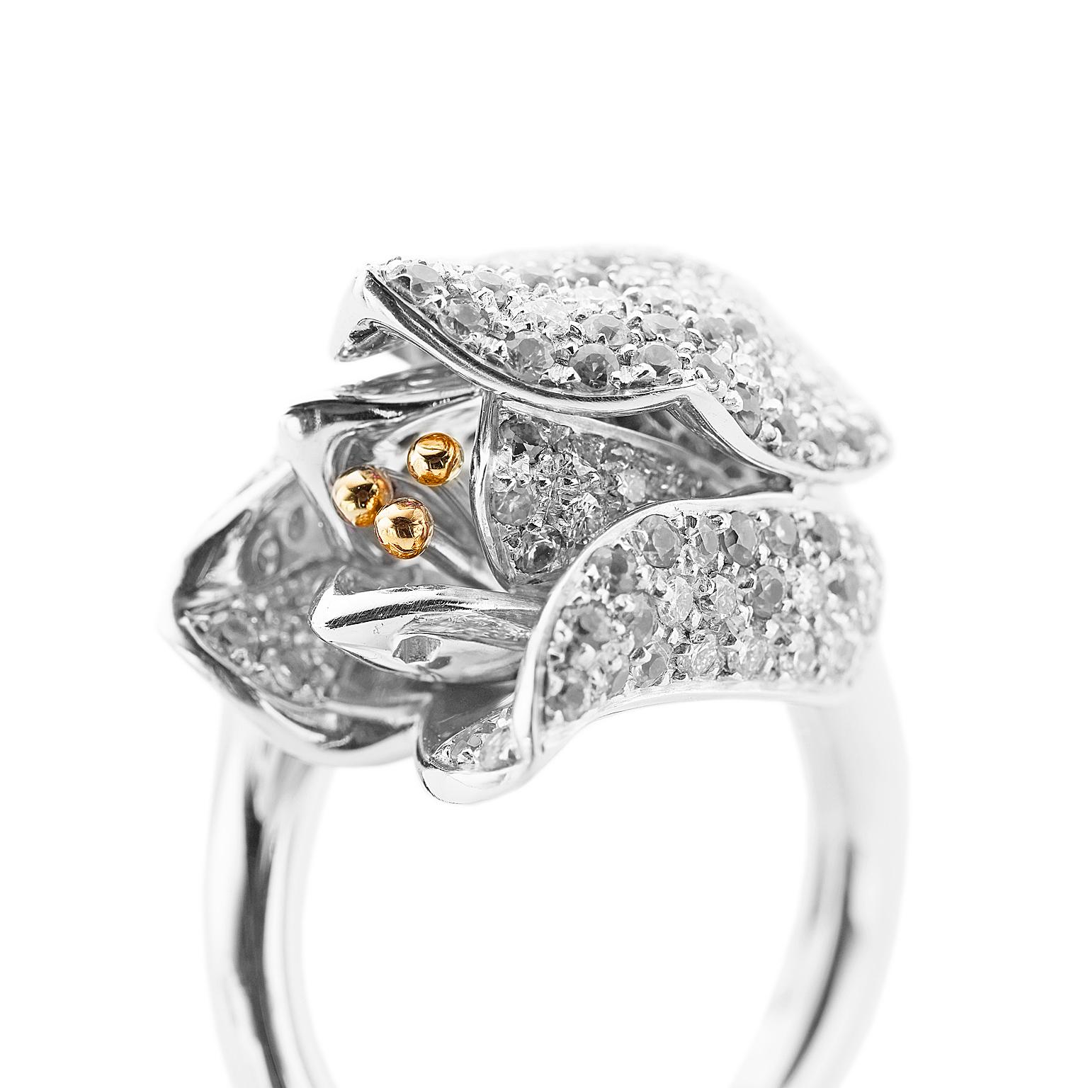2.60 Carat White Diamond White 18 Kt Gold Flower Tulip Cocktail Ring
This ring is inspired by the world of flowers, it's a white tulip with many white diamonds, in total ct 2,60 quality F/G VVS. It has three pistils all of them in red gold. 

The
