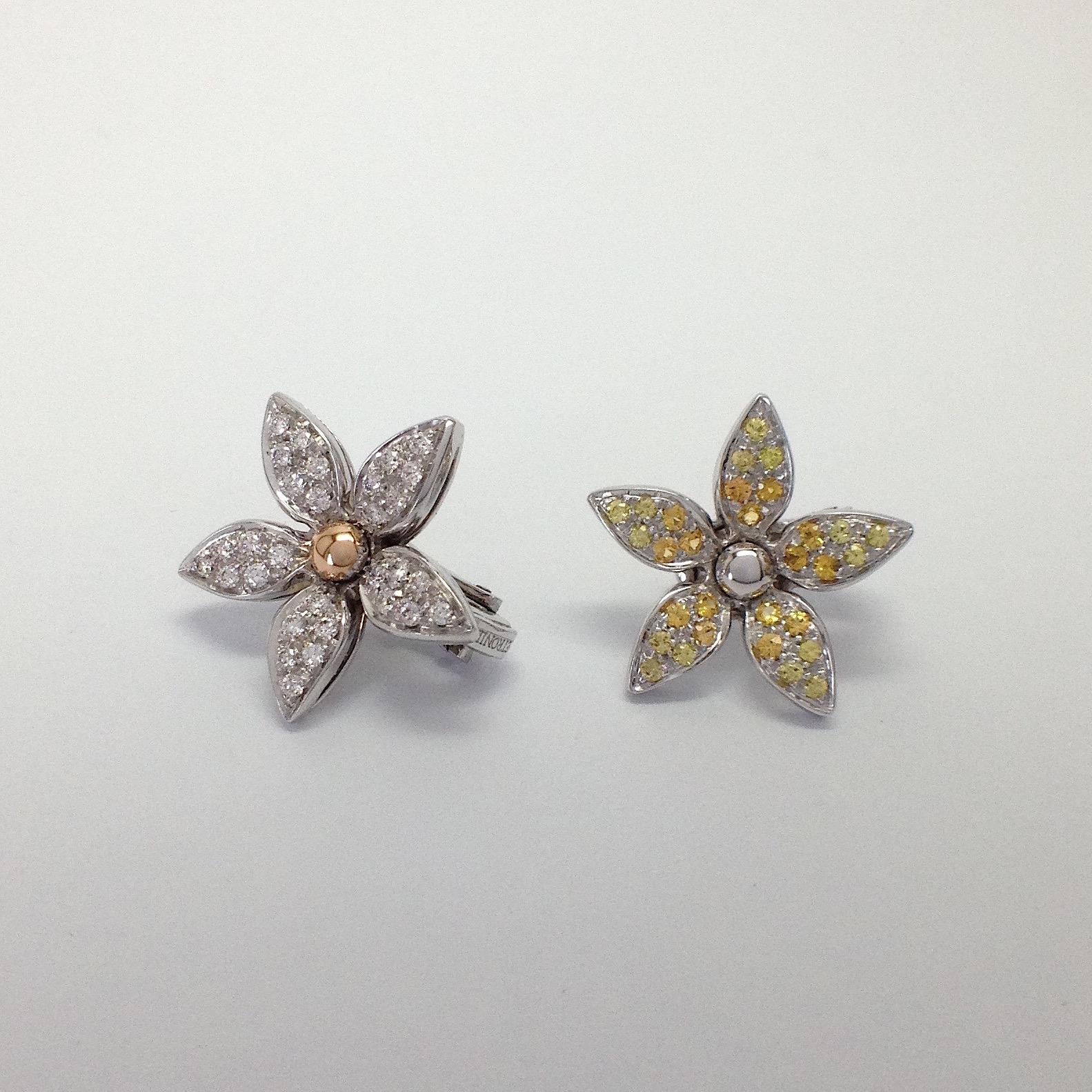 White Diamond Yellow Sapphire 18 Karat Gold Flower Stud Earrings Made in Italy
Inspired by clematis flowers, I made this pair of white gold earrings. An earring has petals set with diamonds and pistil and rose gold. The other has the petals set with