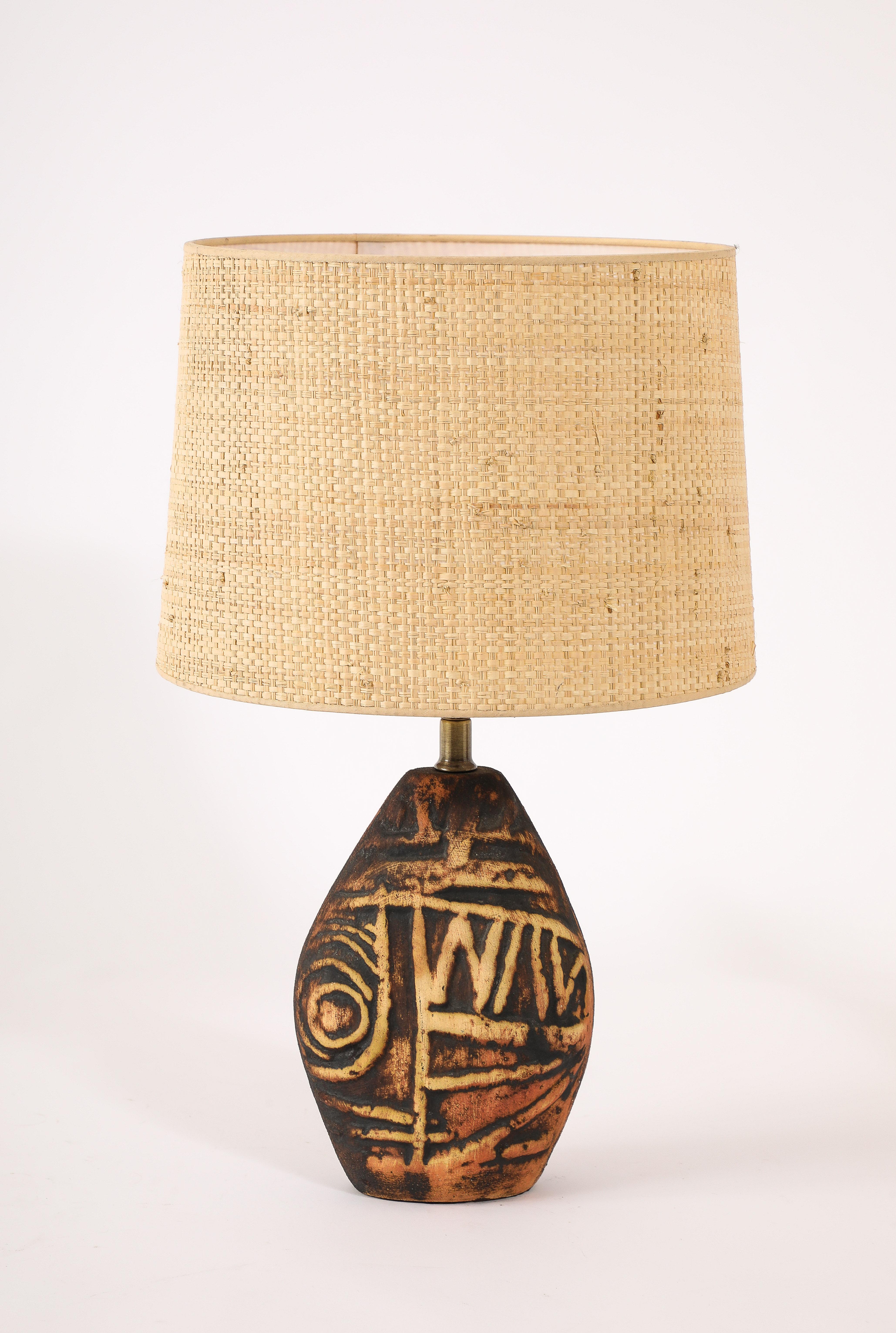 Brown glazed “Scraffito” Table lamps. Base size only
16x10x4.

