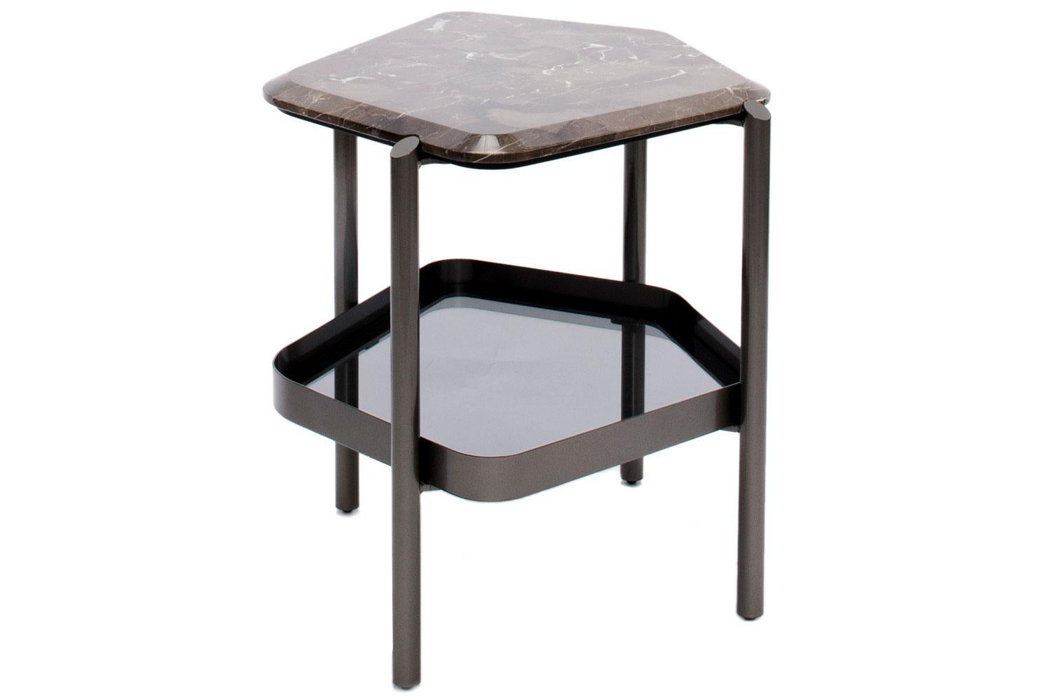 Skyline side table by Giorgetti

Skyline is a series of tables with customizable shapes and finishes from Giorgetti. Our side table on display is a pentagonal shaped low table with a metal frame finished in pewter. The overall shape of this piece