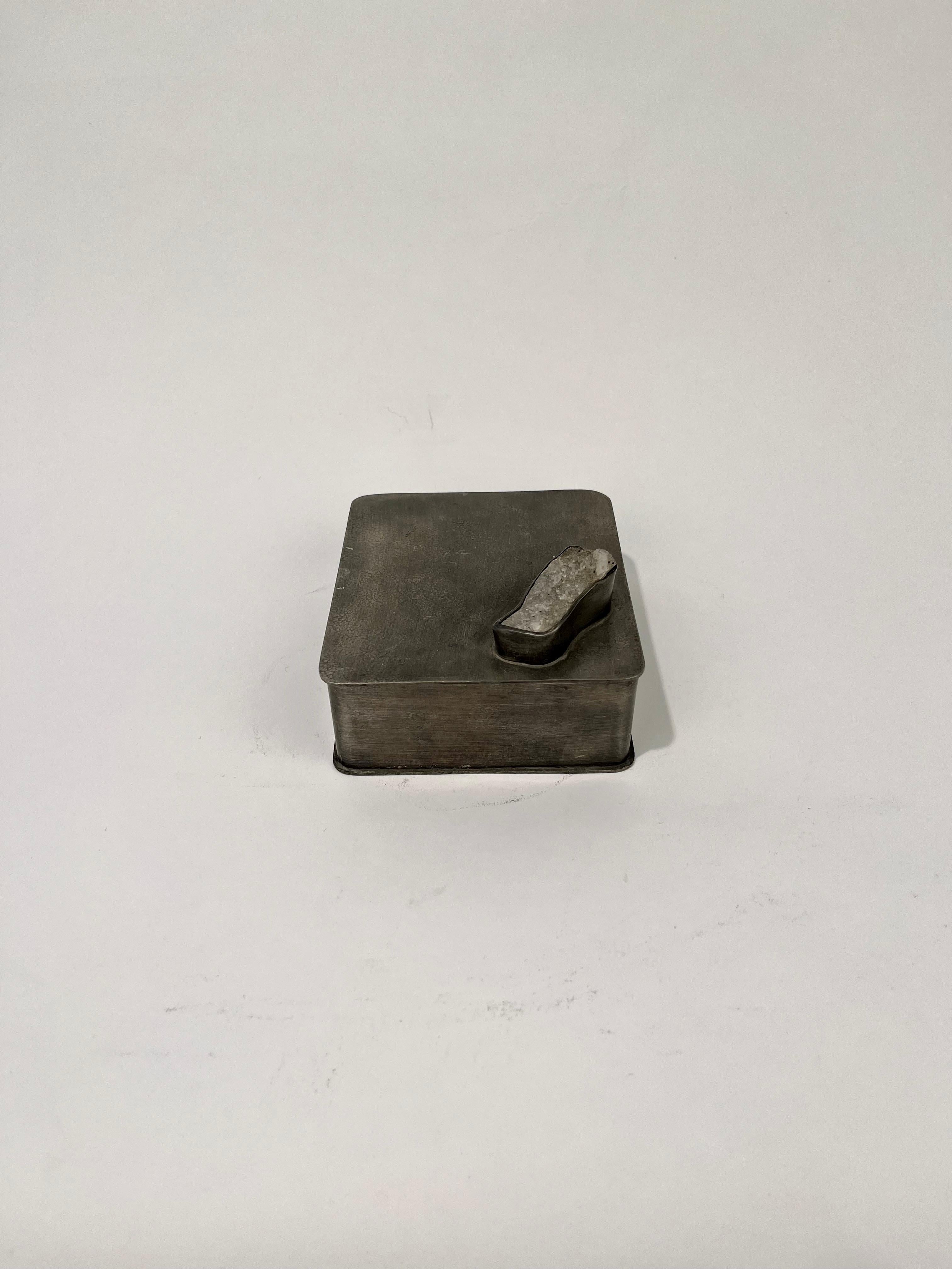 Pewter box with mountain crystal on the lid.
No known designer or manufacturer.