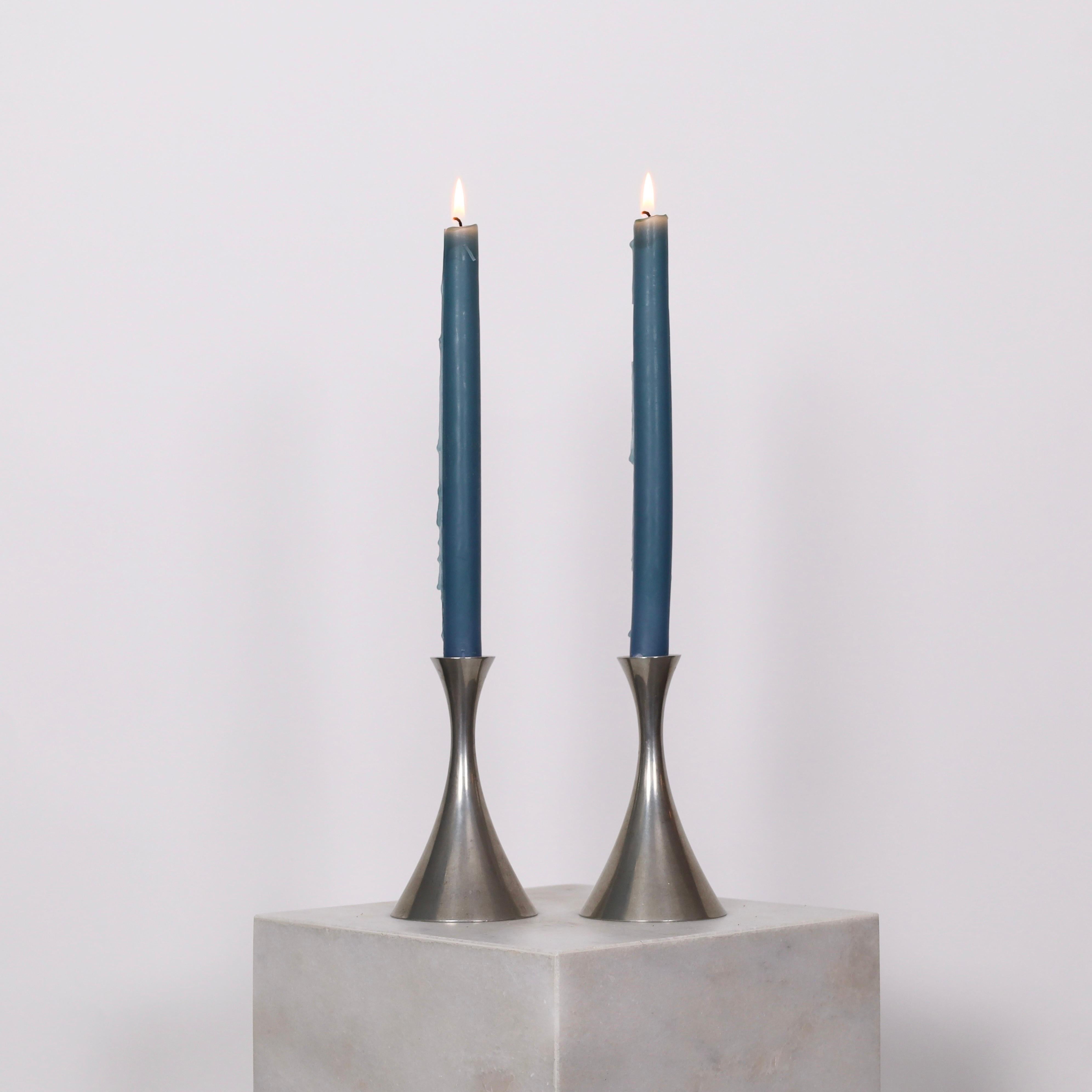 Set of Pewter Candlestick Holders designed by Arne Erkers for Just Andersen in 1952. An elegant set for a beautiful place.

* Set of round Candleholders in Pewter
* Designer: Arne Erkers
* Manufacturer: Just Andersen
* Style: 2691
* Year: 1952
*
