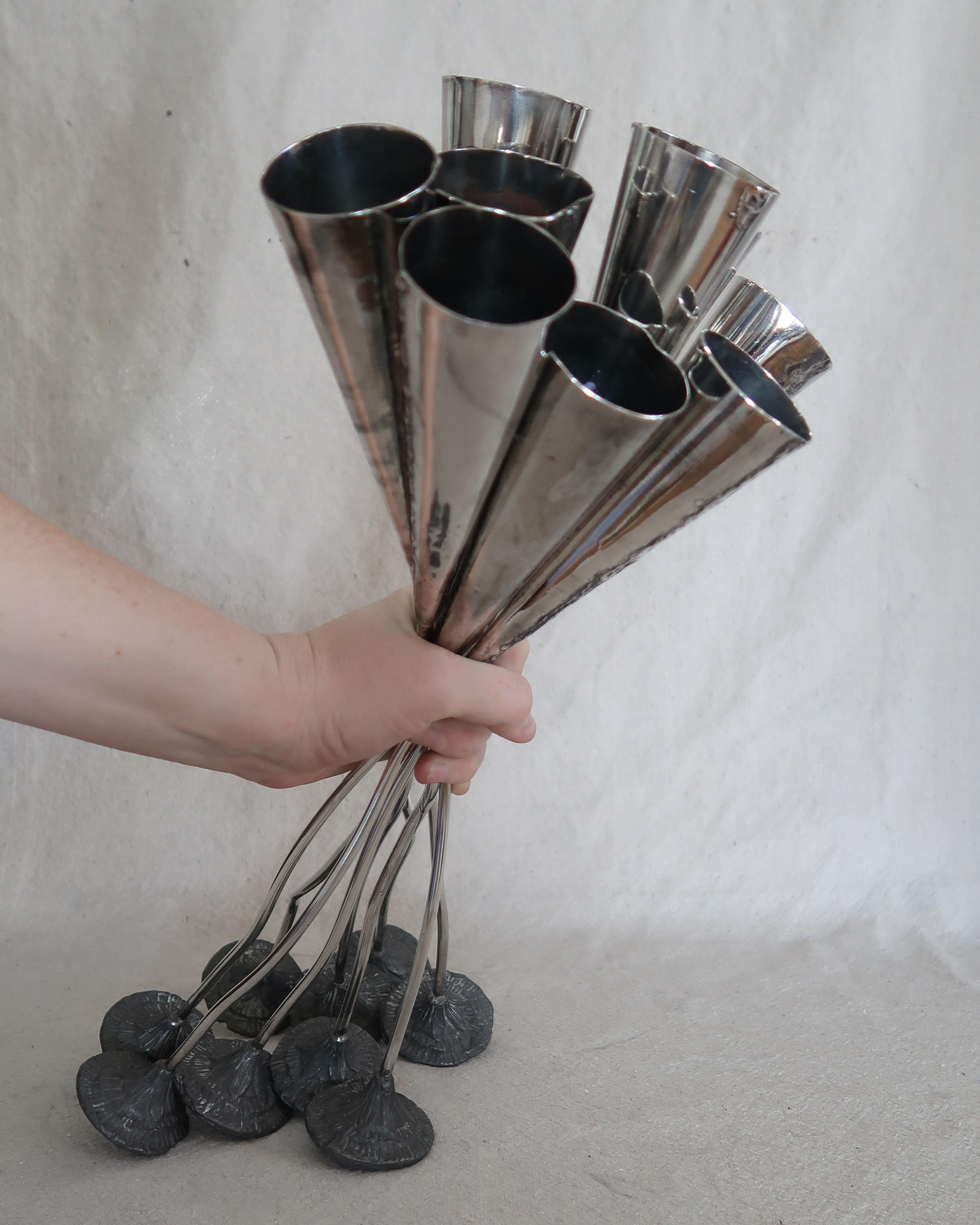 Tall, sculptural, and just the right amount of strange. These vintage pewter candlesticks feel like something out of a dream—slightly insect-like with sinuous stems and tapered cone tops. They’ve got that bizarre elegance that makes you do a double