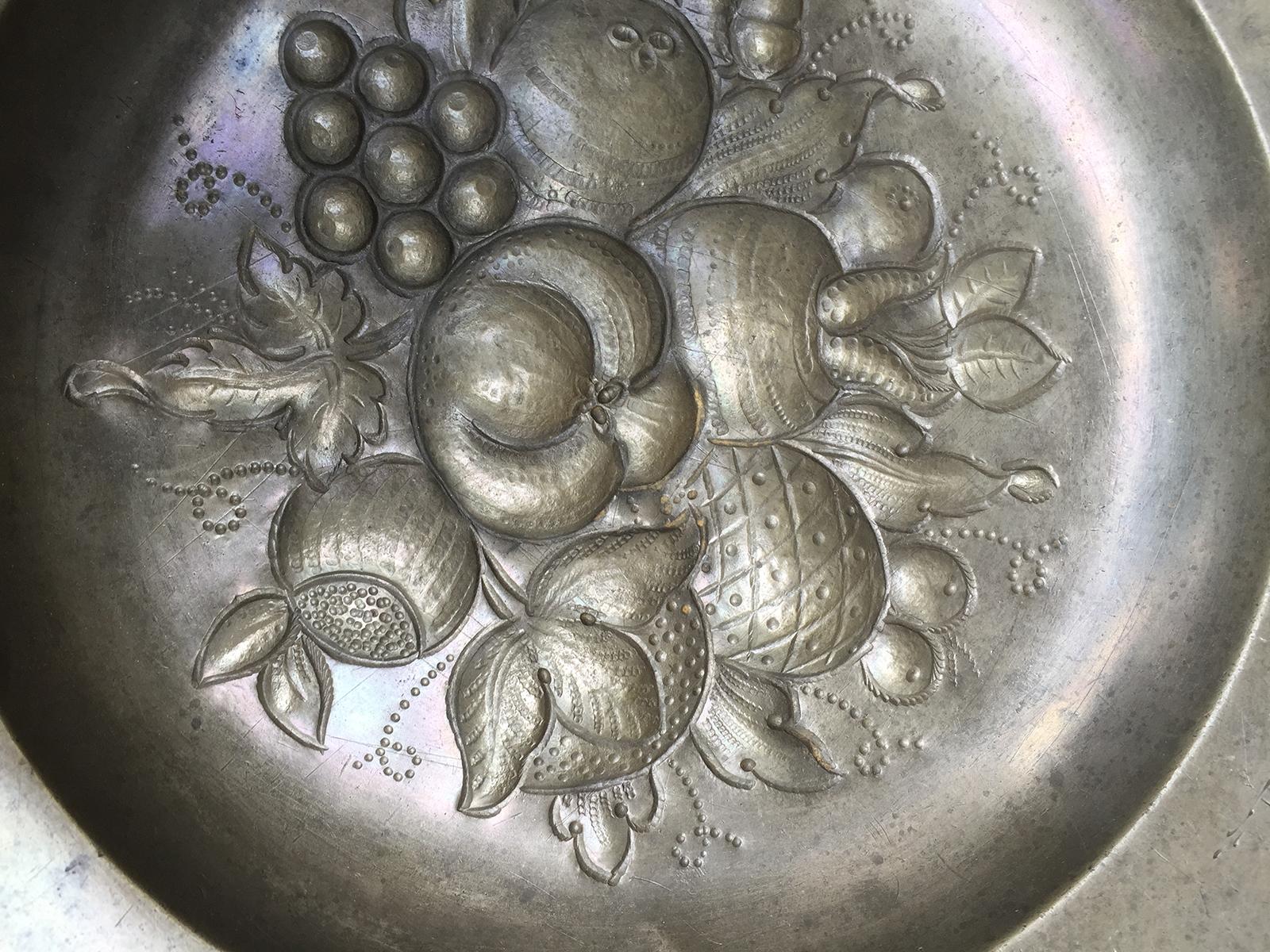 Pewter charger with fruit, possibly American, circa 1771
Eagle mark.