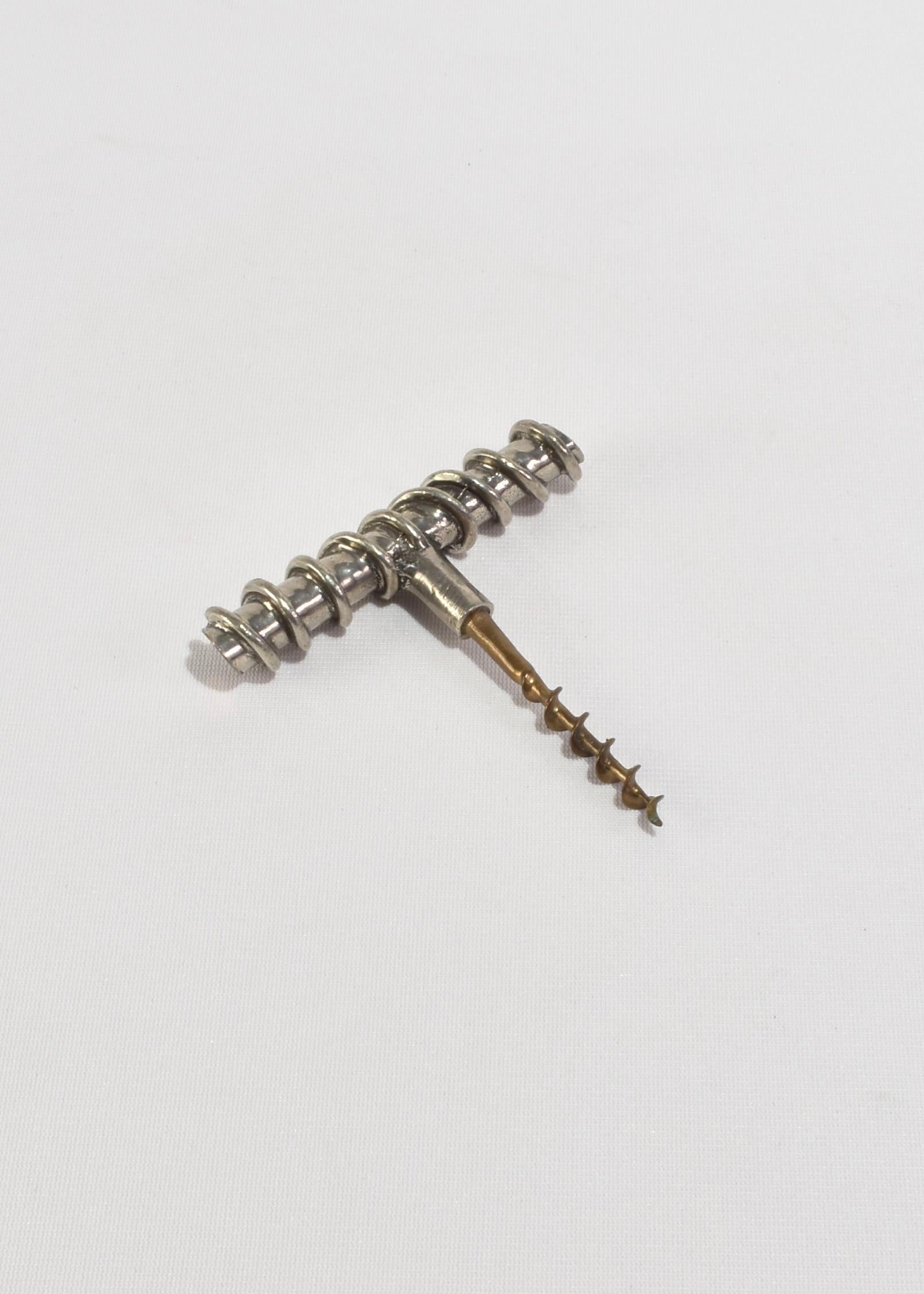 Vintage, handmade pewter and bronze corkscrew with spiral detailing.
