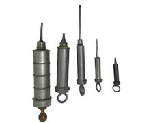 Pewter enema syringe with piston action, 19th century