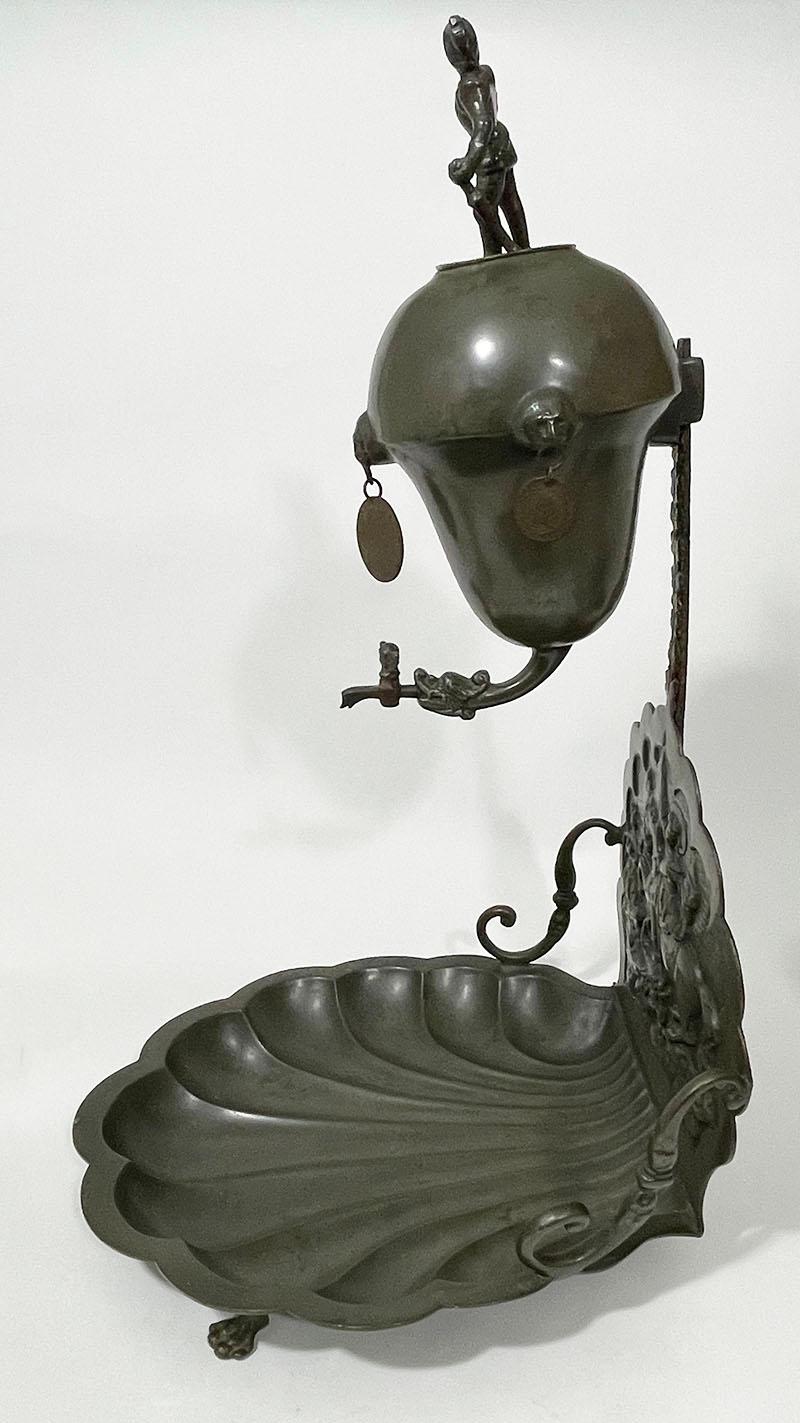 Pewter fountain and basin with a scene of Saint George and the dragon For Sale 11