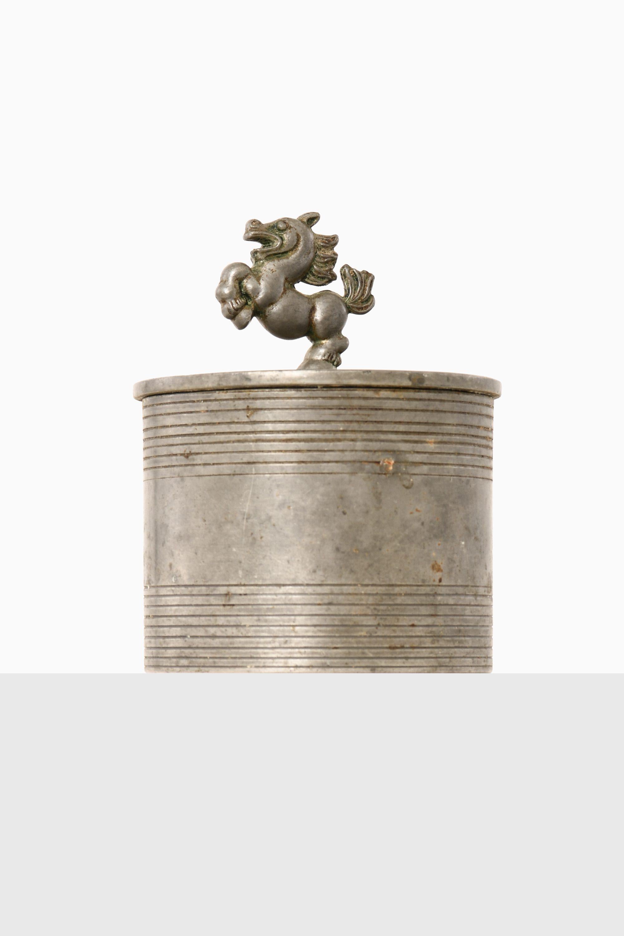 Pewter Jar Designed by Sylvia Stave, 1929

Additional Information:
Material: Pewter
Produced by C.G. Hallberg in Sweden
Dimensions: (W x D x H): 9 x 9 x 11 cm
Condition: Good vintage condition, with small signs of usage