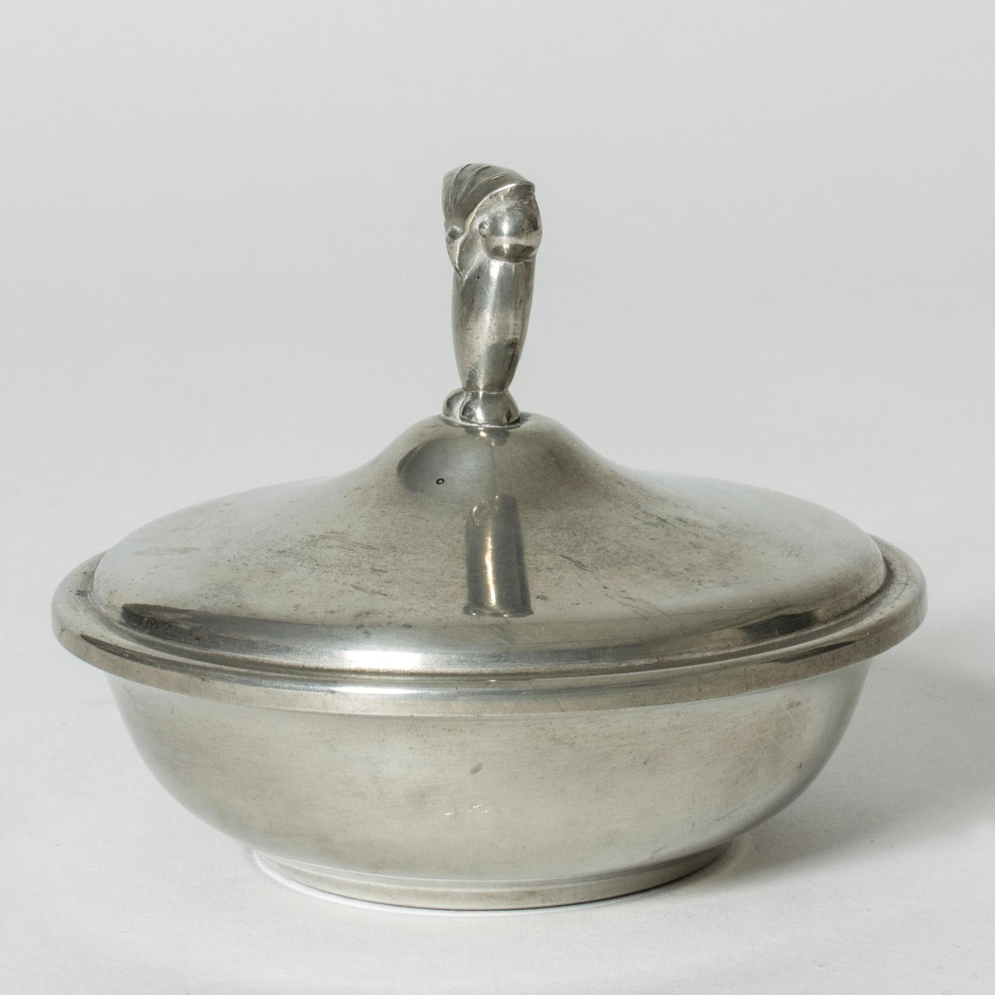 Gorgeous little pewter jar from GAB, with a stern looking owl acting as a knob.

GAB was founded in Stockholm in 1867 and was an important influence on the Swedish art and crafts and industrial design scenes for more than a century. Jakob Ängman,