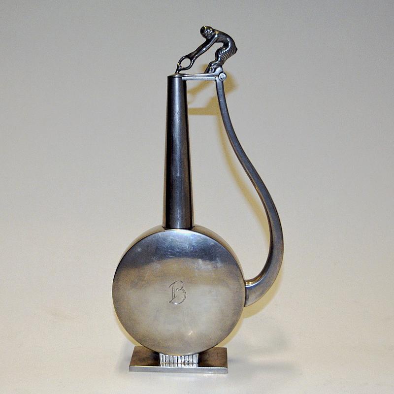 Scandinavian Modern Pewter jug with a faun lid top by GAB Tenn, Sweden 1933 For Sale