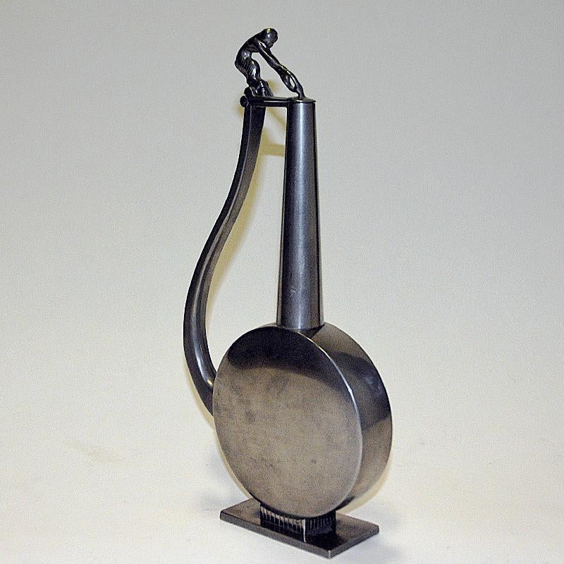 Pewter jug with a faun lid top by GAB Tenn, Sweden 1933 In Good Condition For Sale In Stockholm, SE