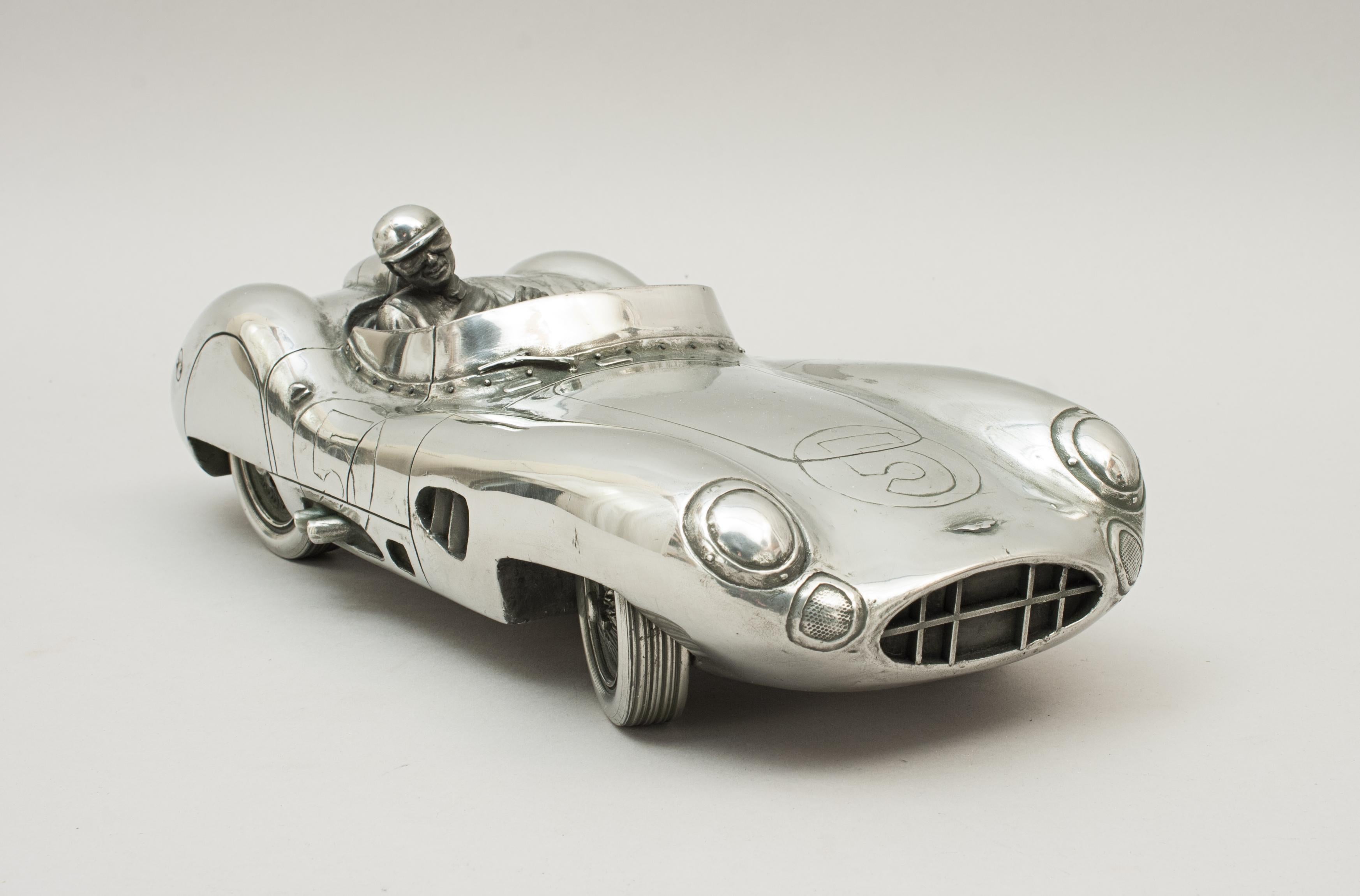 1959 Le Mans-winning #5 Aston Martin DBR1/2 by Compulsion Gallery.
The iconic 1950s Aston Martin DBR sports car is crafted by an innovative process, quite unique to Compulsion Gallery. Their sculptures are all hand cast in a special high density