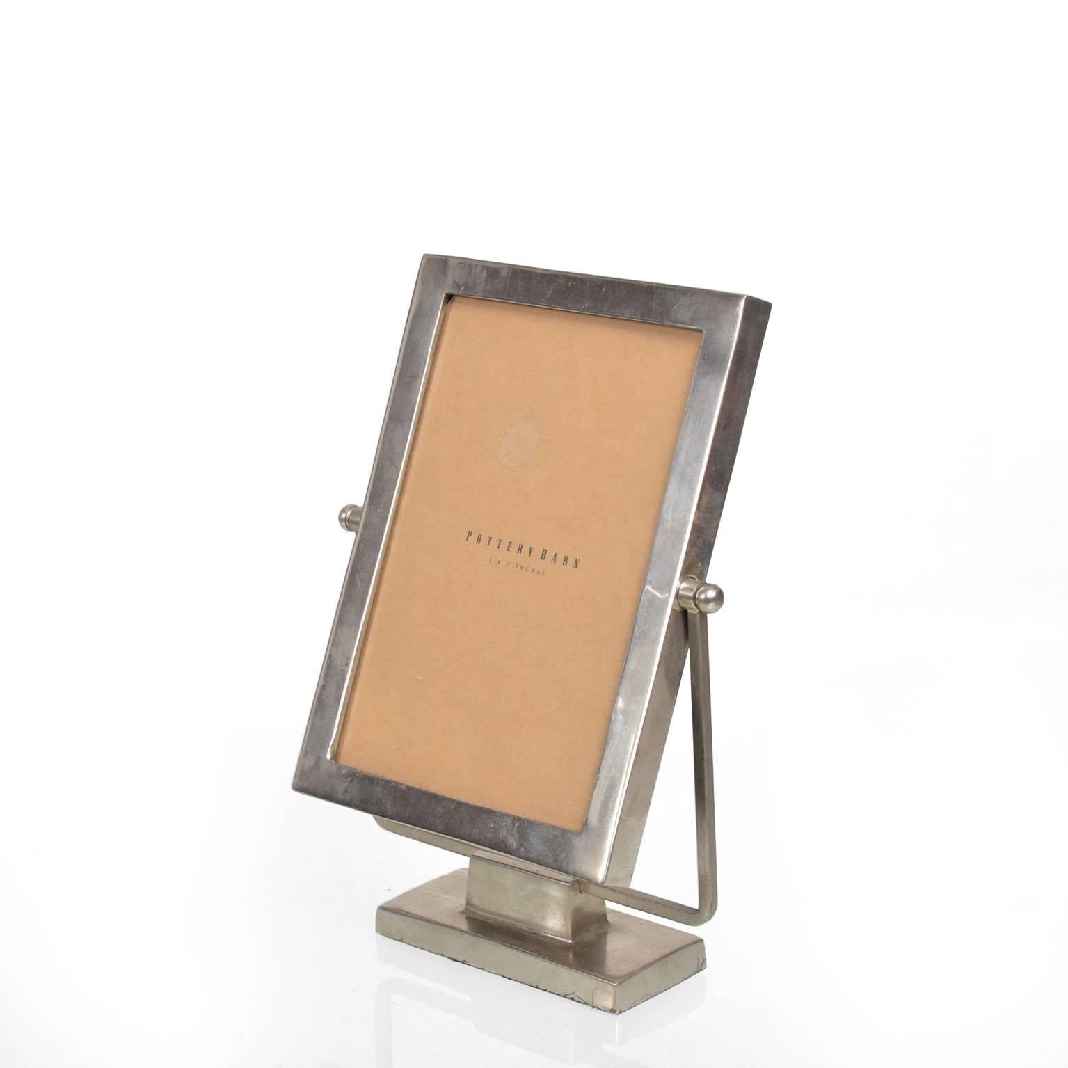For your consideration a nice pewter picture frame on base measure: 5